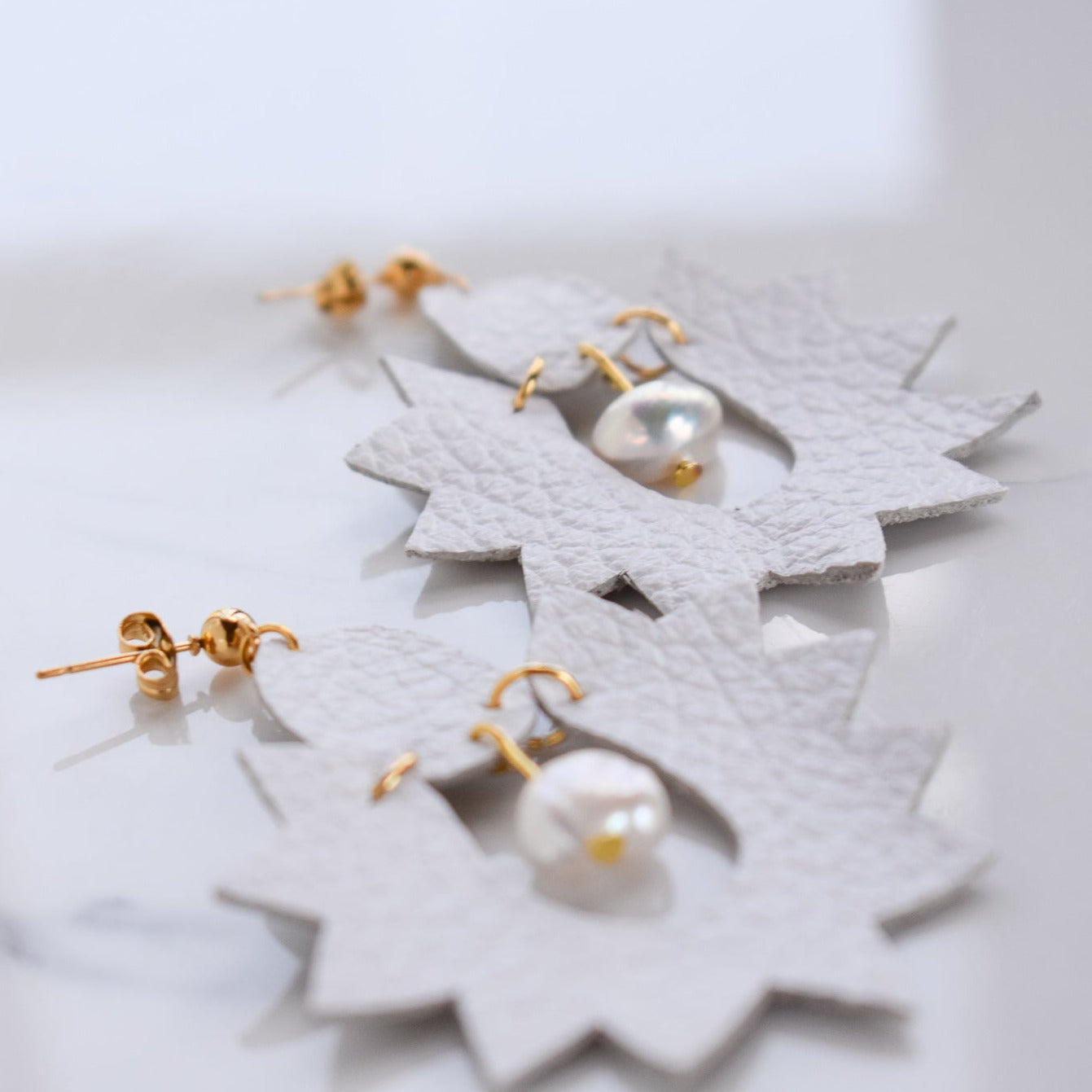 Handmade, light weight and comfortable to wear all day long leather earrings. All our earring hooks are made with a high quality stainless steel and they are hypo allergenic. They will not tarnish or irritate your sensitive skin.