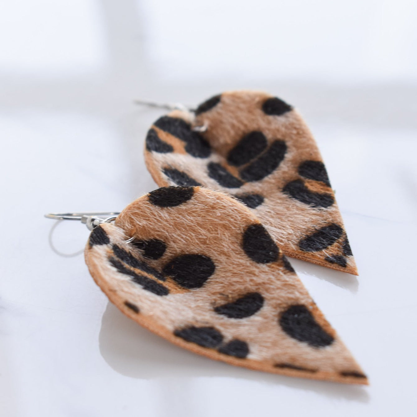Handmade, light weight and comfortable to wear all day long leather earrings. All our earring hooks are made with a high quality stainless steel and they are hypo allergenic. They will not tarnish or irritate your sensitive skin.