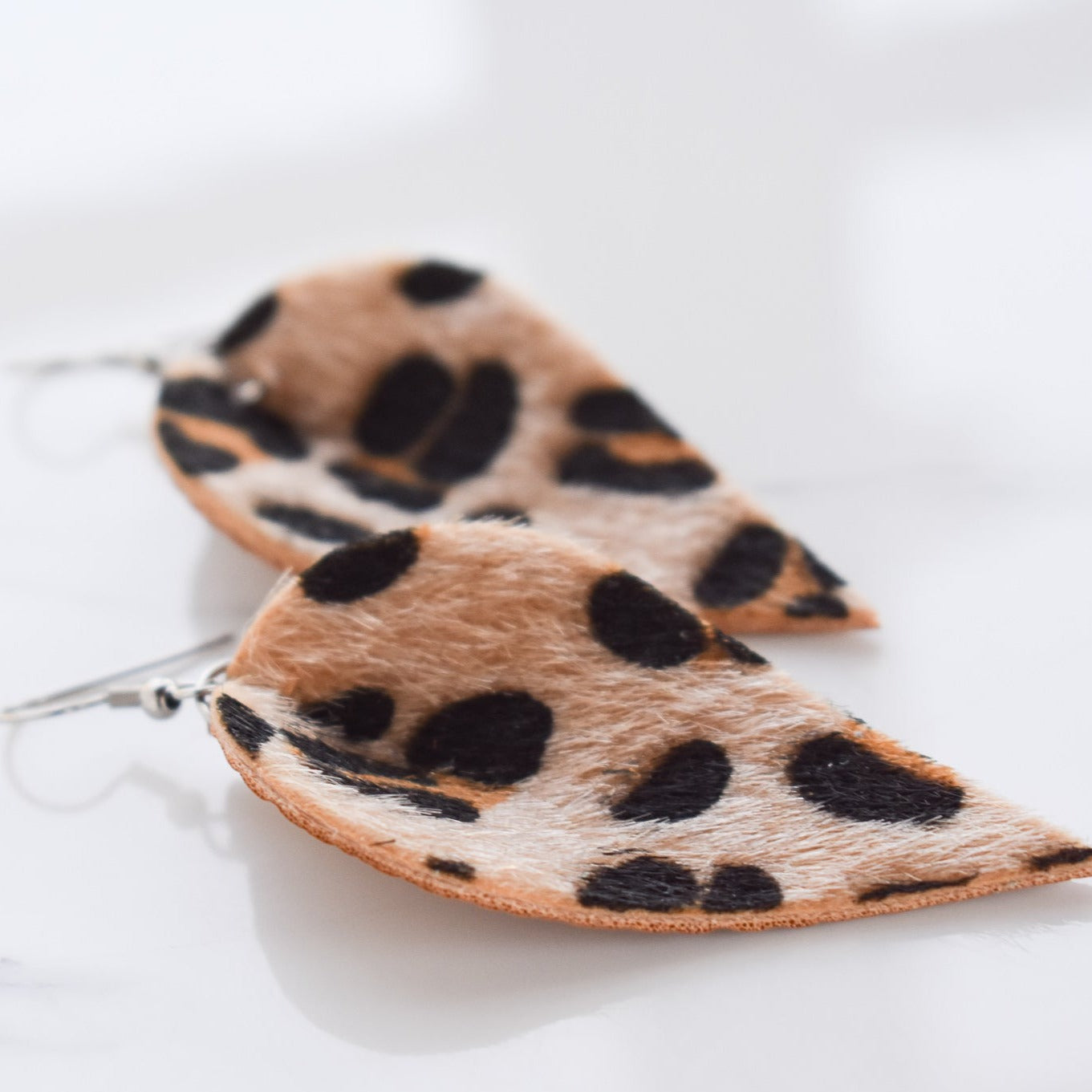 Handmade, light weight and comfortable to wear all day long leather earrings. All our earring hooks are made with a high quality stainless steel and they are hypo allergenic. They will not tarnish or irritate your sensitive skin.