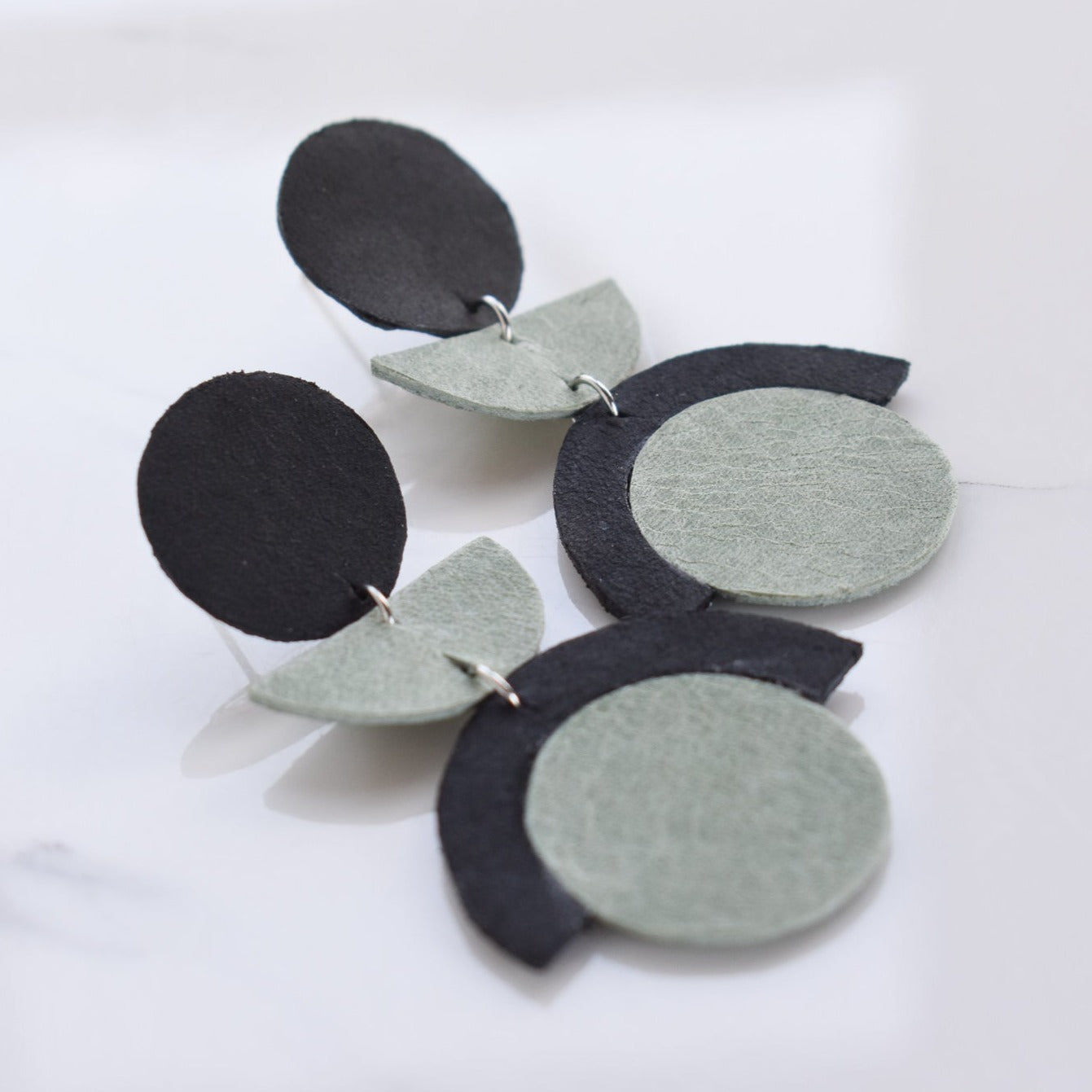 Handmade, light weight and comfortable to wear all day long leather earrings. All our earring hooks are made with a high quality stainless steel and they are hypo allergenic. They will not tarnish or irritate your sensitive skin.
