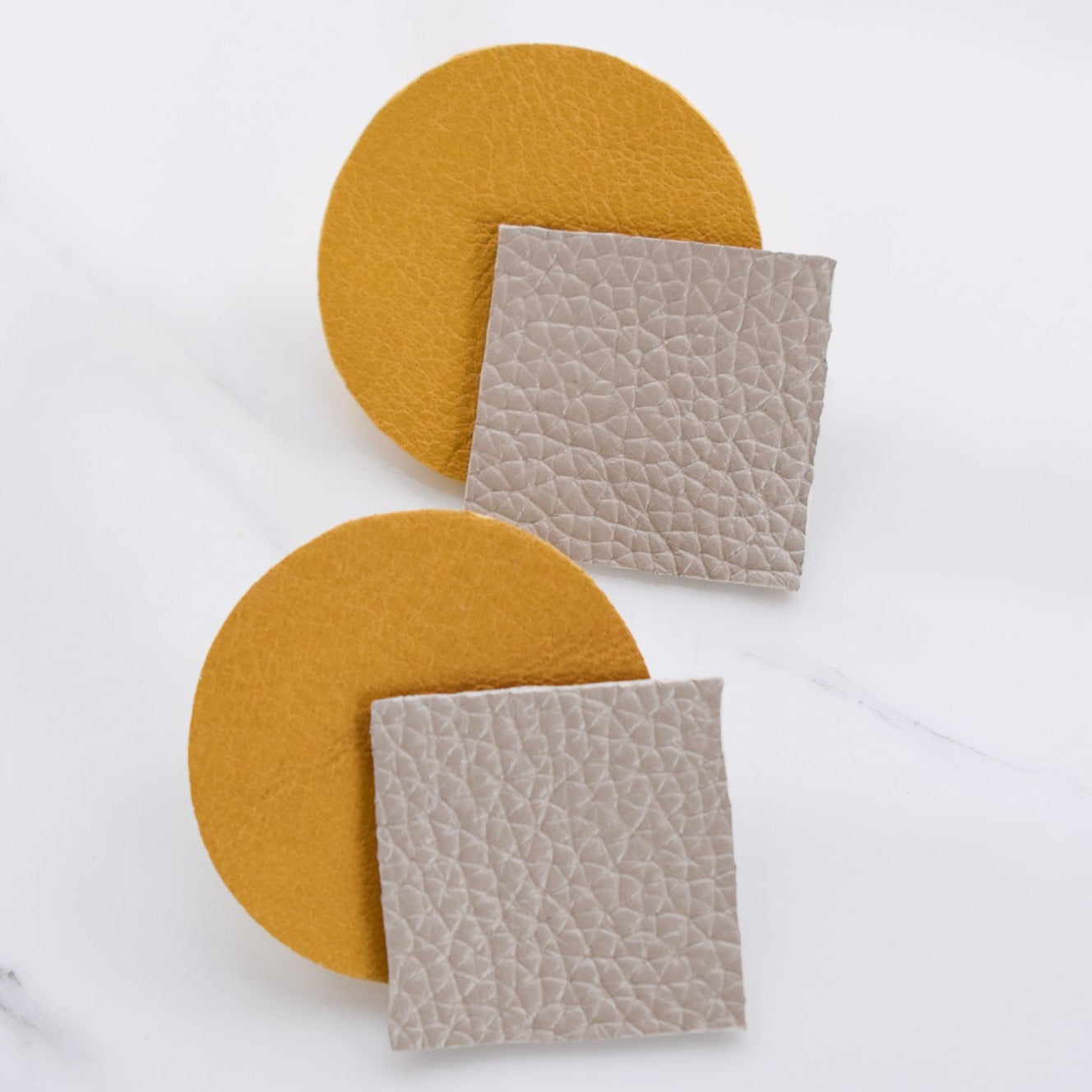 Handmade, light weight and comfortable to wear all day long leather earrings. All our earring hooks are made with a high quality stainless steel and they are hypo allergenic. They will not tarnish or irritate your sensitive skin.