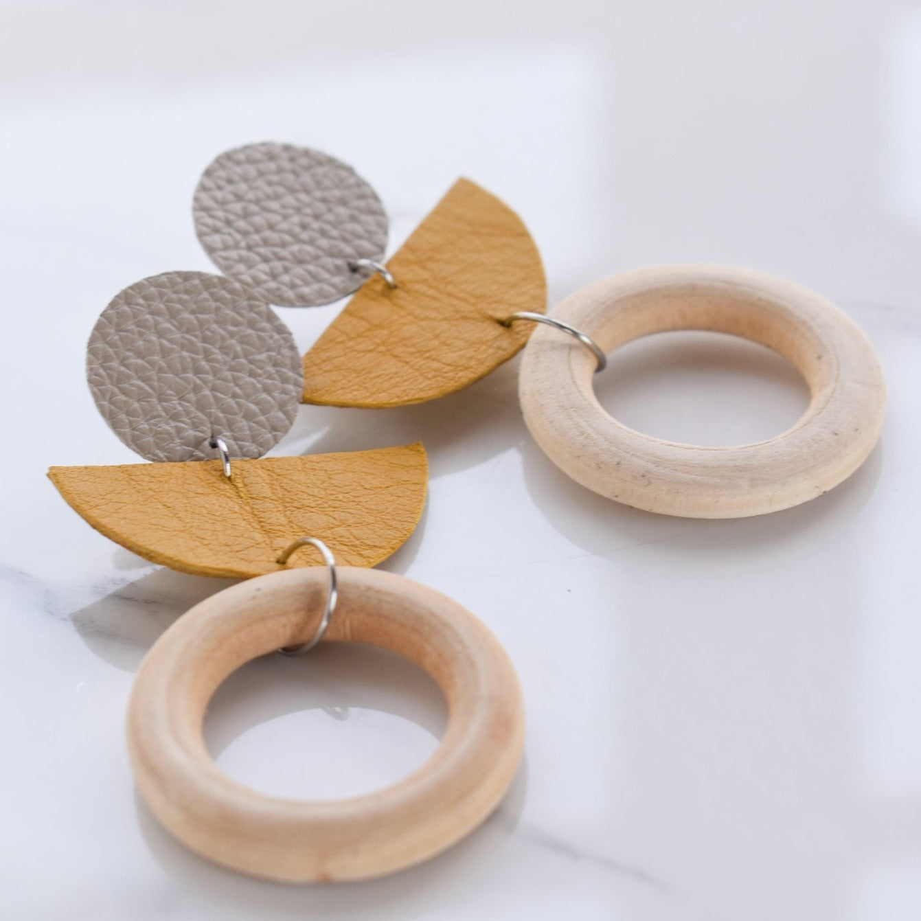 Handmade, light weight and comfortable to wear all day long leather earrings. All our earring hooks are made with a high quality stainless steel and they are hypo allergenic. They will not tarnish or irritate your sensitive skin.