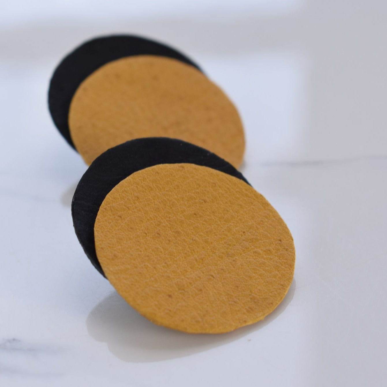 Handmade, light weight and comfortable to wear all day long leather earrings. All our earring hooks are made with a high quality stainless steel and they are hypo allergenic. They will not tarnish or irritate your sensitive skin.