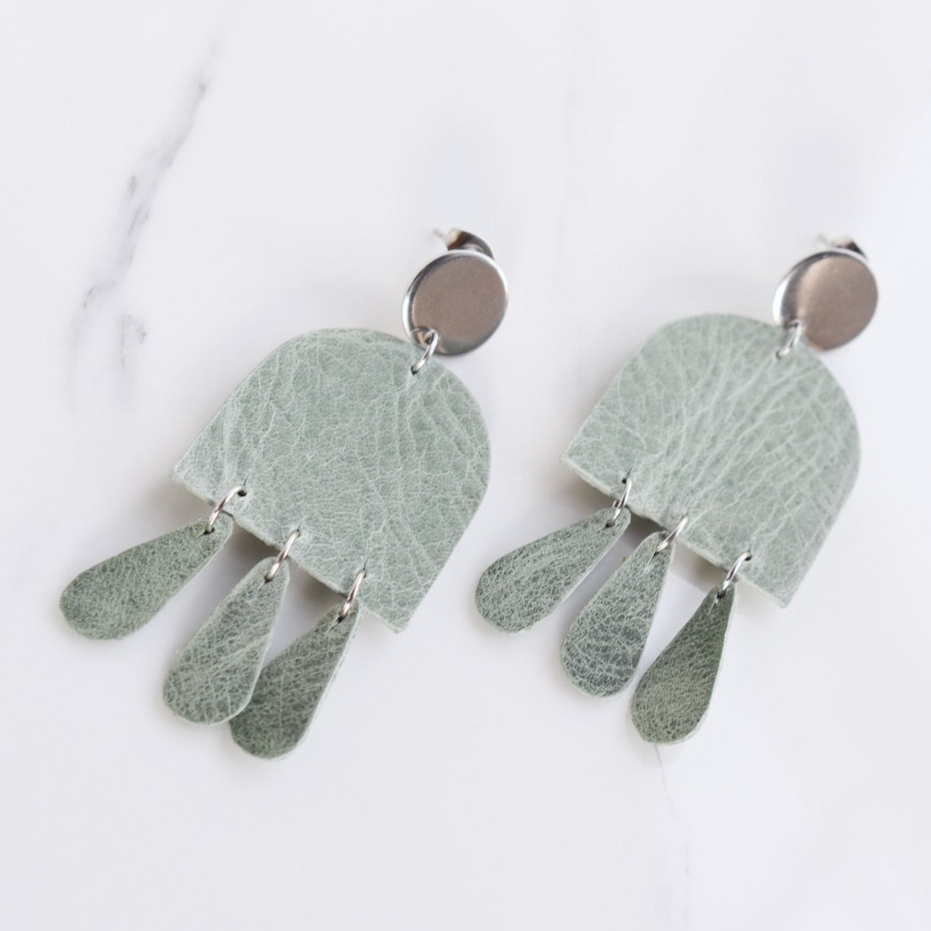 Handmade, light weight and comfortable to wear all day long leather earrings. All our earring hooks are made with a high quality stainless steel and they are hypo allergenic. They will not tarnish or irritate your sensitive skin.