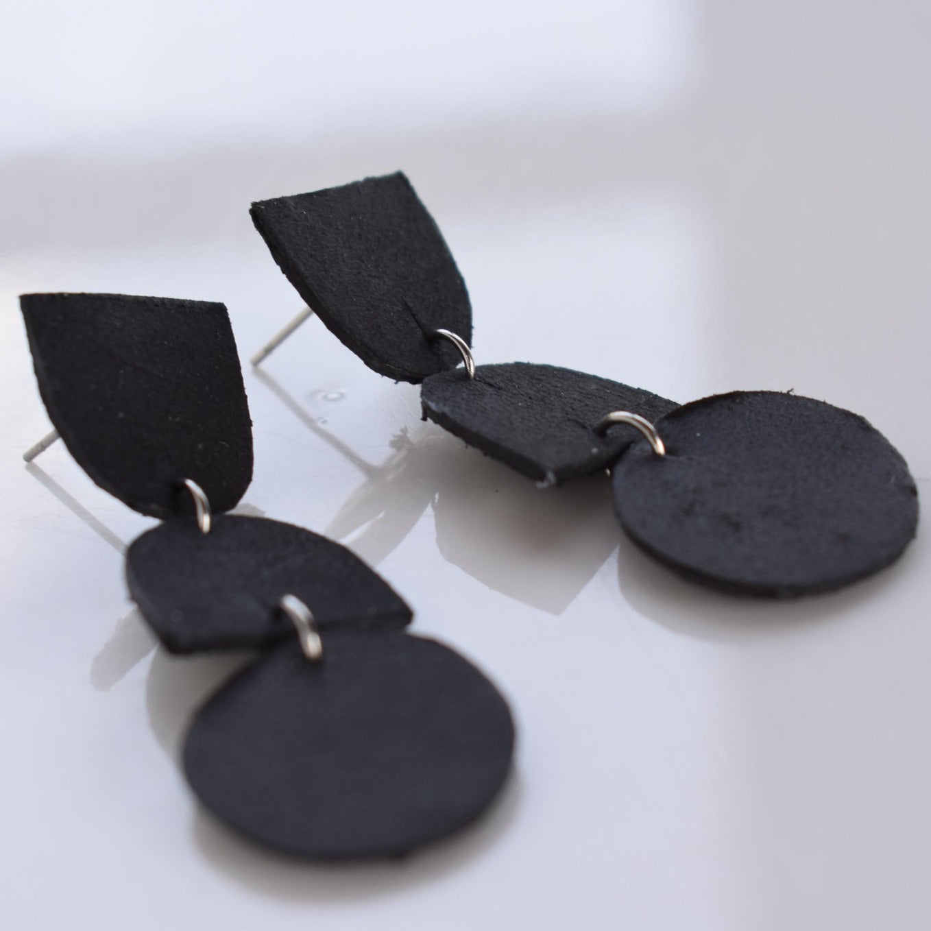 Handmade, light weight and comfortable to wear all day long leather earrings. All our earring hooks are made with a high quality stainless steel and they are hypo allergenic. They will not tarnish or irritate your sensitive skin.