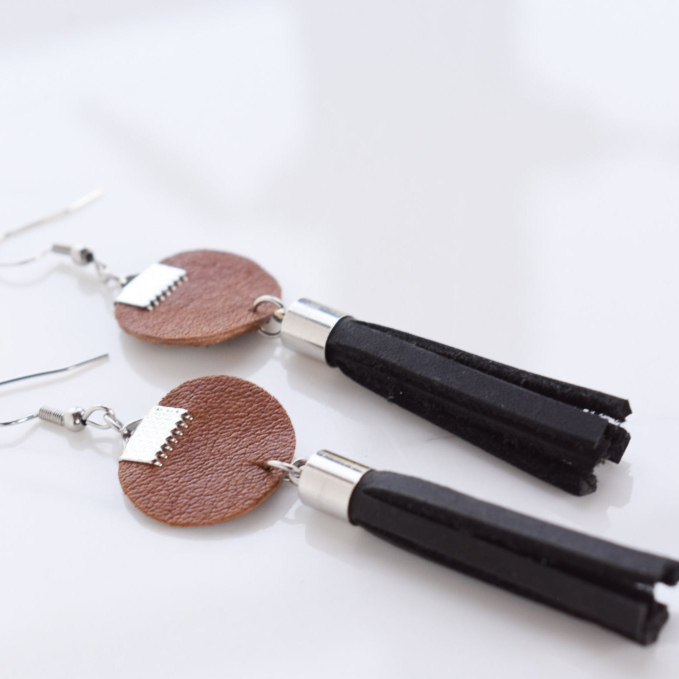 Handmade, light weight and comfortable to wear all day long leather earrings. All our earring hooks are made with a high quality stainless steel and they are hypo allergenic. They will not tarnish or irritate your sensitive skin.
