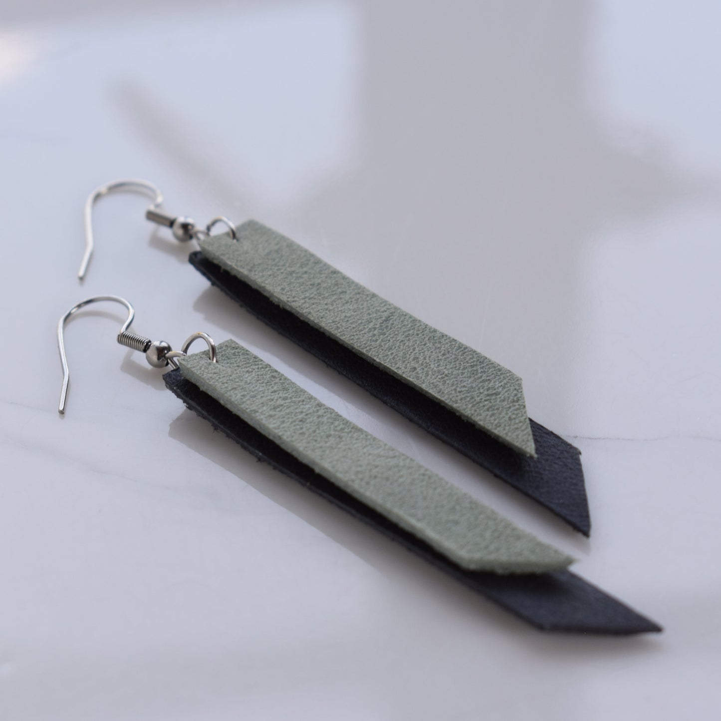 Handmade, light weight and comfortable to wear all day long leather earrings. All our earring hooks are made with a high quality stainless steel and they are hypo allergenic. They will not tarnish or irritate your sensitive skin.