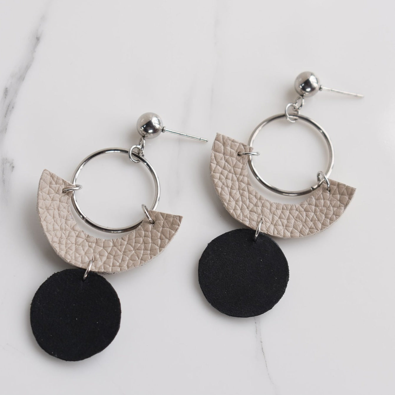 Handmade, light weight and comfortable to wear all day long leather earrings. All our earring hooks are made with a high quality stainless steel and they are hypo allergenic. They will not tarnish or irritate your sensitive skin.