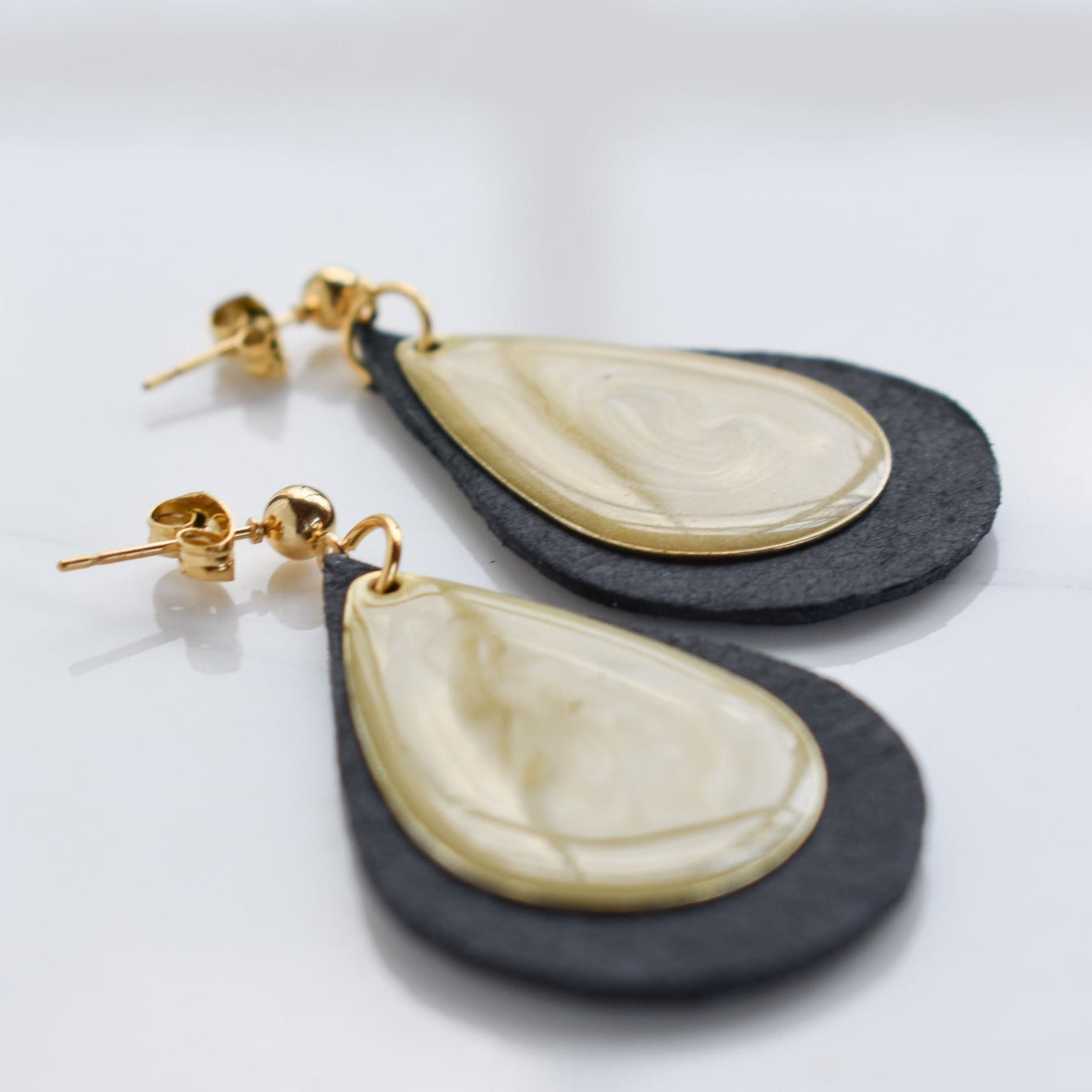 Handmade, light weight and comfortable to wear all day long leather earrings. All our earring hooks are made with a high quality stainless steel and they are hypo allergenic. They will not tarnish or irritate your sensitive skin.