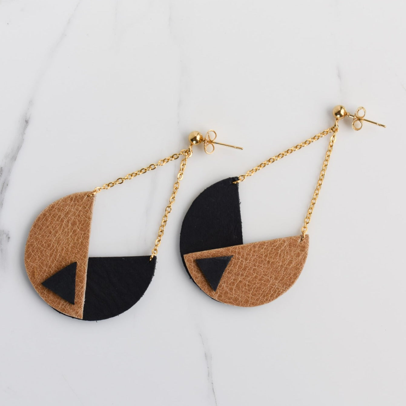 Handmade, light weight and comfortable to wear all day long leather earrings. All our earring hooks are made with a high quality stainless steel and they are hypo allergenic. They will not tarnish or irritate your sensitive skin.