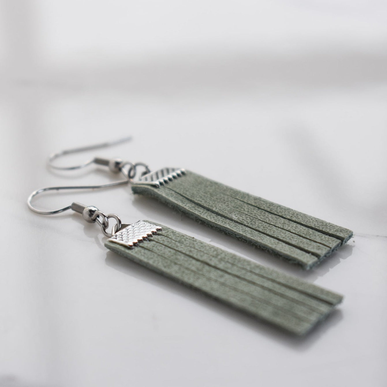 Handmade, light weight and comfortable to wear all day long leather earrings. All our earring hooks are made with a high quality stainless steel and they are hypo allergenic. They will not tarnish or irritate your sensitive skin.