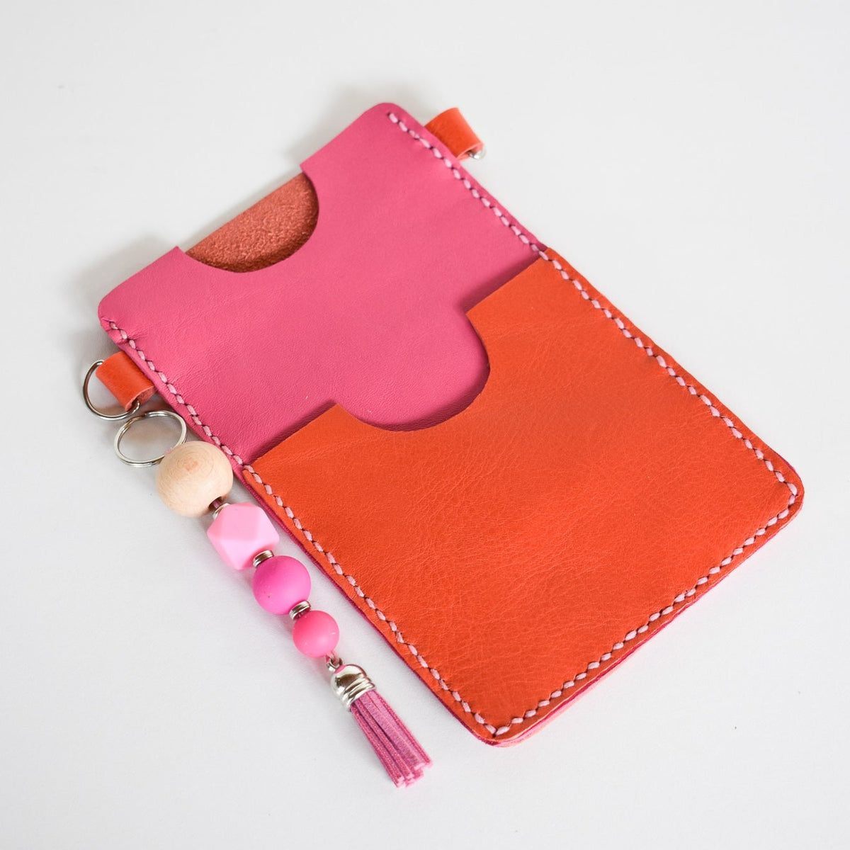 Beautifully handmade and hand stitched leather cellphone sling. Perfect for everyday use. It has a slot for cards and cash. Turn your sling towards your body for extra safety. This also makes an amazing gift and addition to a bridesmaids gift box. YOUR NEW BEST FRIEND - keep your belongings HANDS ON!
