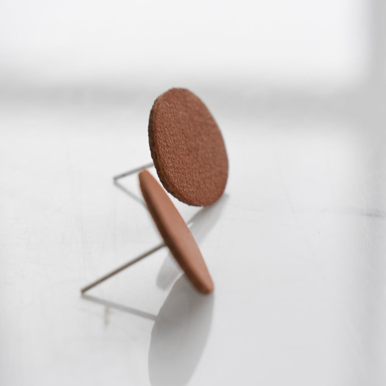 Handmade, light weight and comfortable to wear all day long leather earrings. All our earring hooks are made with a high quality stainless steel and they are hypo allergenic. They will not tarnish or irritate your sensitive skin.