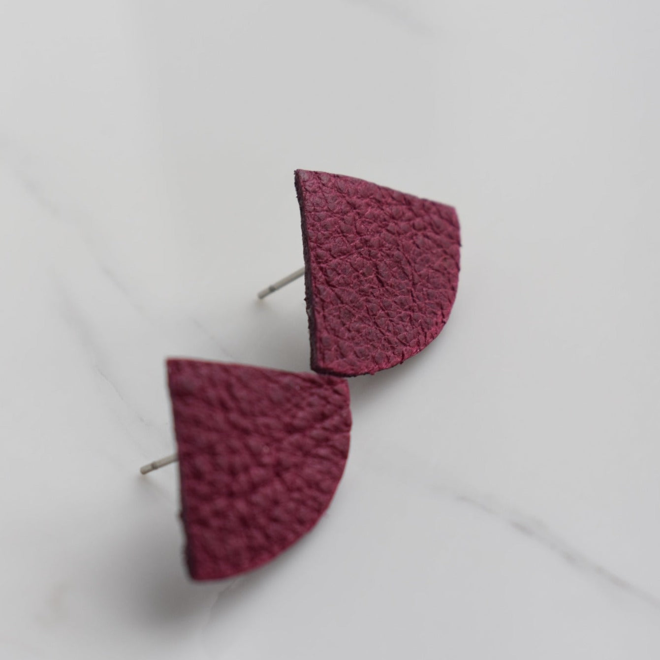 Handmade, light weight and comfortable to wear all day long leather earrings. All our earring hooks are made with a high quality stainless steel and they are hypo allergenic. They will not tarnish or irritate your sensitive skin.