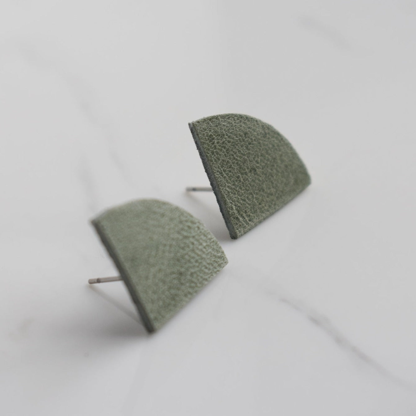 Handmade, light weight and comfortable to wear all day long leather earrings. All our earring hooks are made with a high quality stainless steel and they are hypo allergenic. They will not tarnish or irritate your sensitive skin.