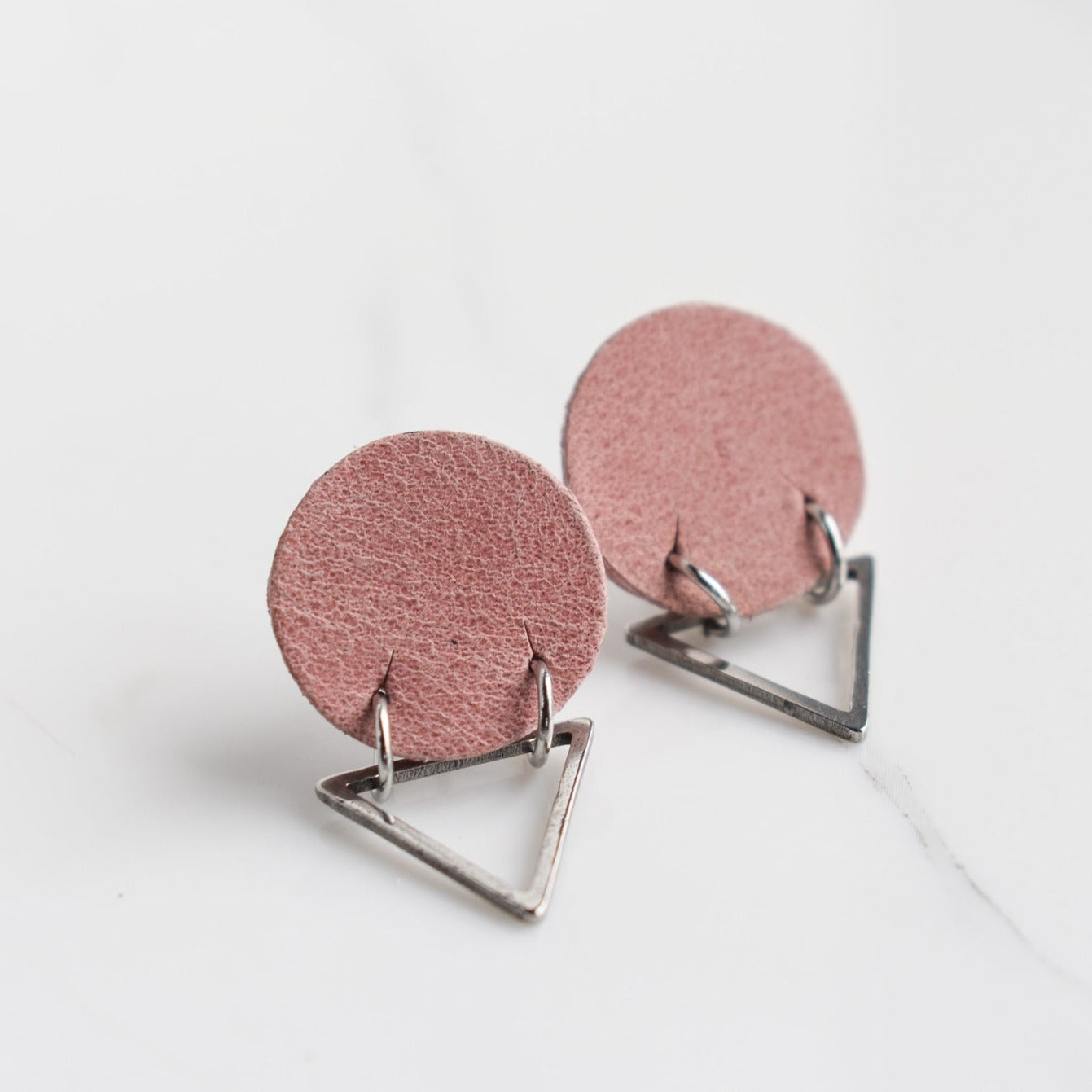 Handmade, light weight and comfortable to wear all day long leather earrings. All our earring hooks are made with a high quality stainless steel and they are hypo allergenic. They will not tarnish or irritate your sensitive skin.