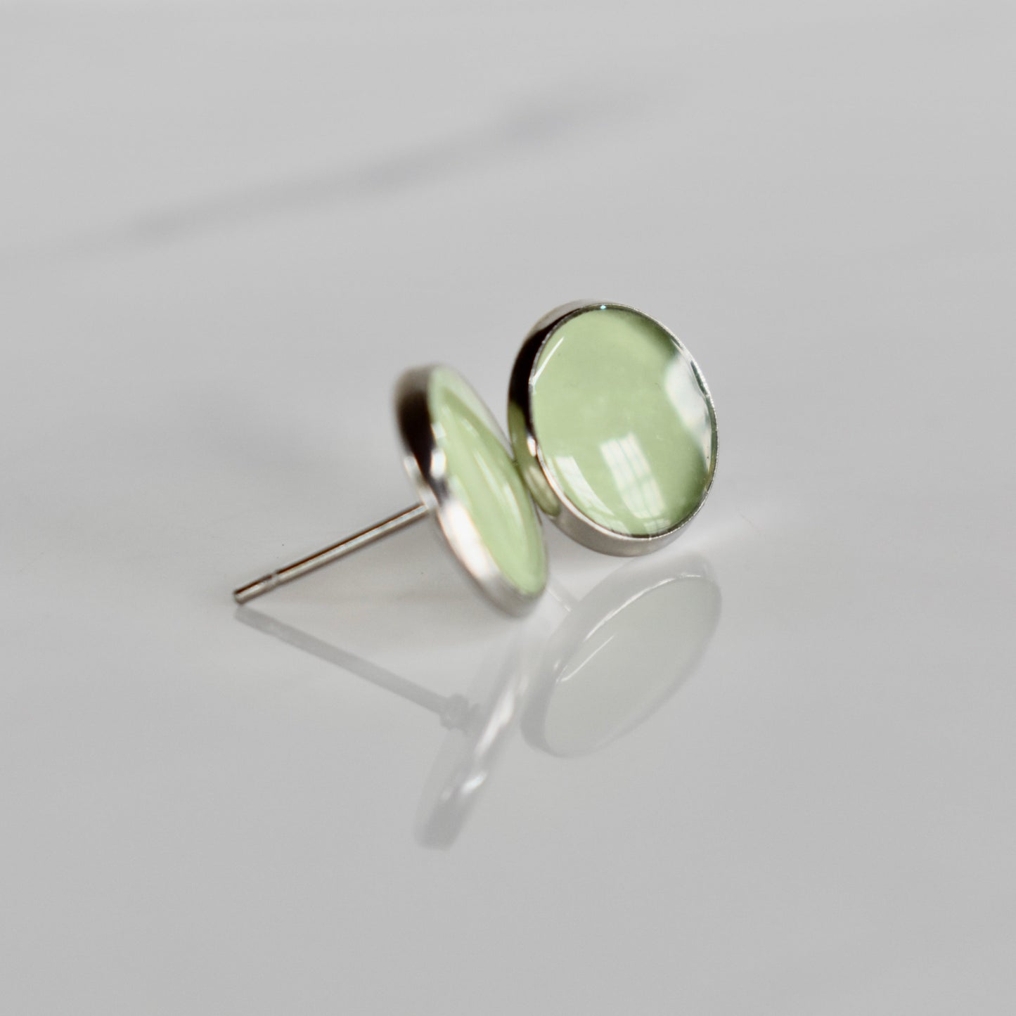 Handmade, light weight and comfortable to wear all day long resin earrings. Available in silver. All our earring hooks are made with a high quality stainless steel and they are hypo allergenic. They will not tarnish or irritate your sensitive skin.