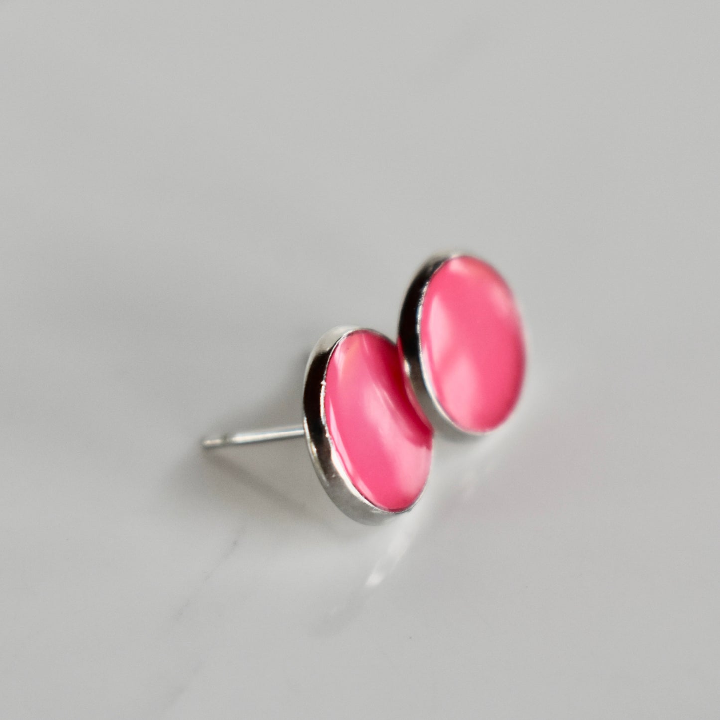 Handmade, light weight and comfortable to wear all day long resin earrings. Available in silver. All our earring hooks are made with a high quality stainless steel and they are hypo allergenic. They will not tarnish or irritate your sensitive skin.