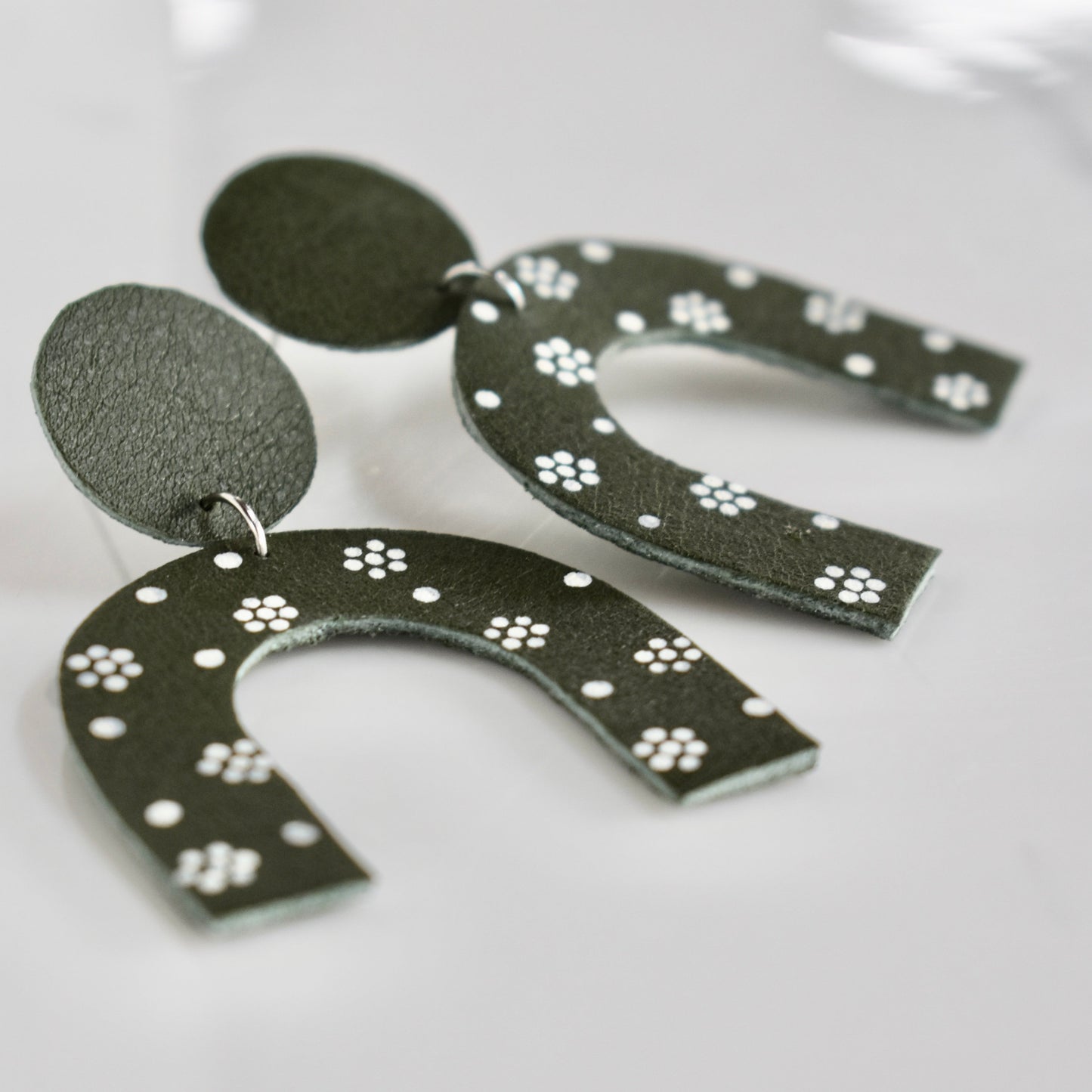Handmade, light weight and comfortable to wear all day long earrings with beads. Available in silver. All our earring hooks are made with a high quality stainless steel and they are hypo allergenic. They will not tarnish or irritate your sensitive skin.