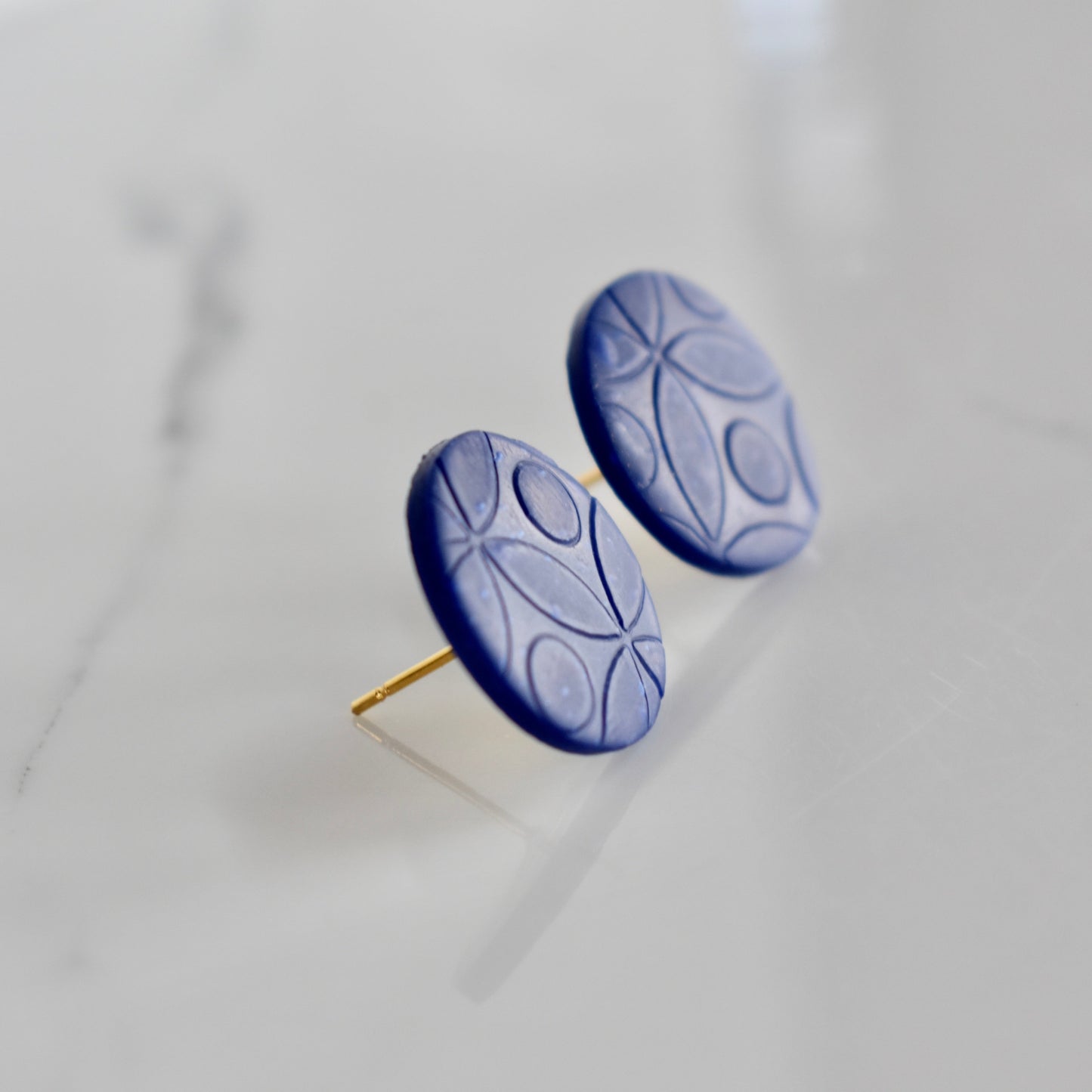 Handmade, light weight and comfortable to wear all day long clay studs earrings. Available in silver or gold. All our earring hooks are made with a high quality stainless steel and they are hypo allergenic. They will not tarnish or irritate your sensitive skin.