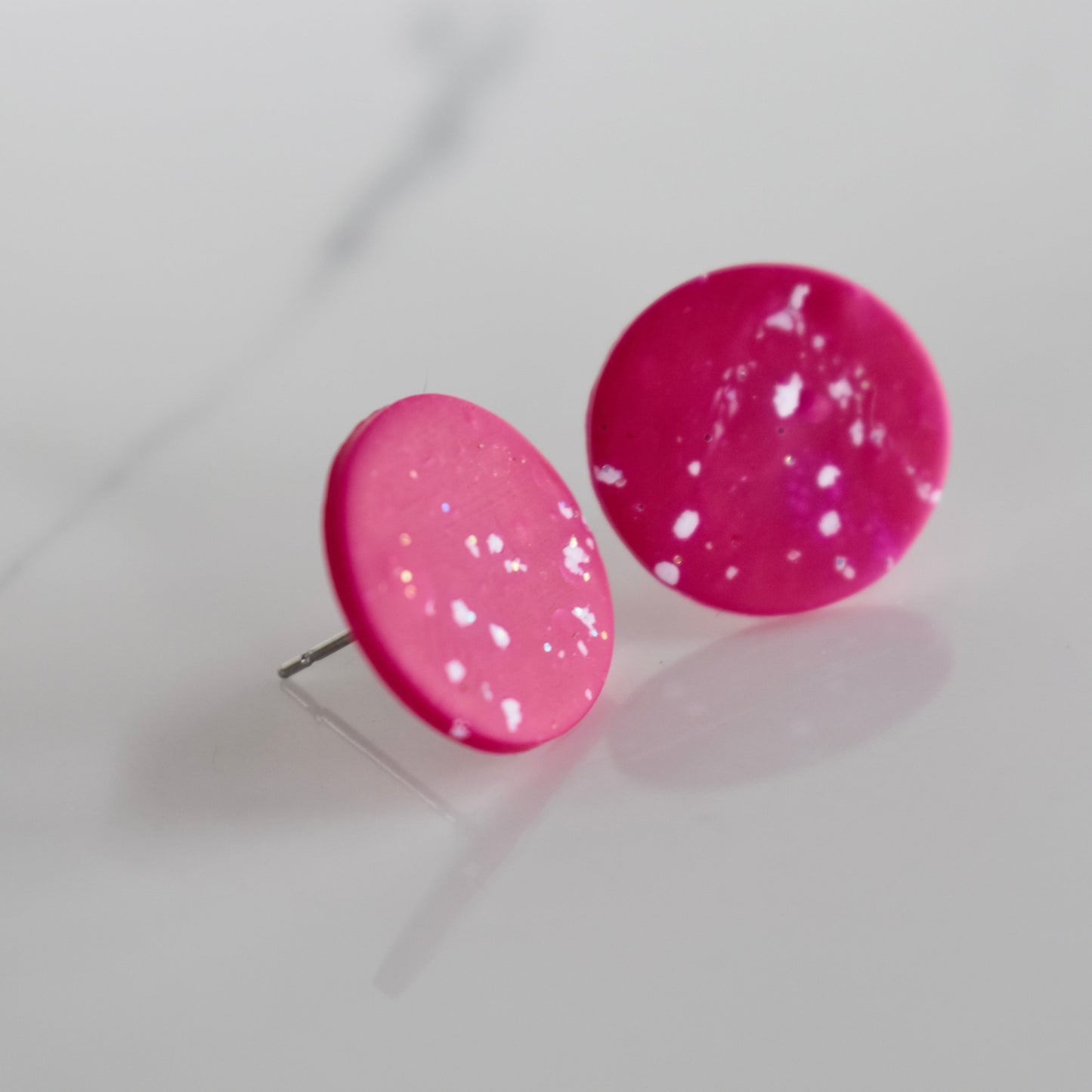 Handmade, light weight and comfortable to wear all day long clay studs earrings. Available in silver or gold. All our earring hooks are made with a high quality stainless steel and they are hypo allergenic. They will not tarnish or irritate your sensitive skin.