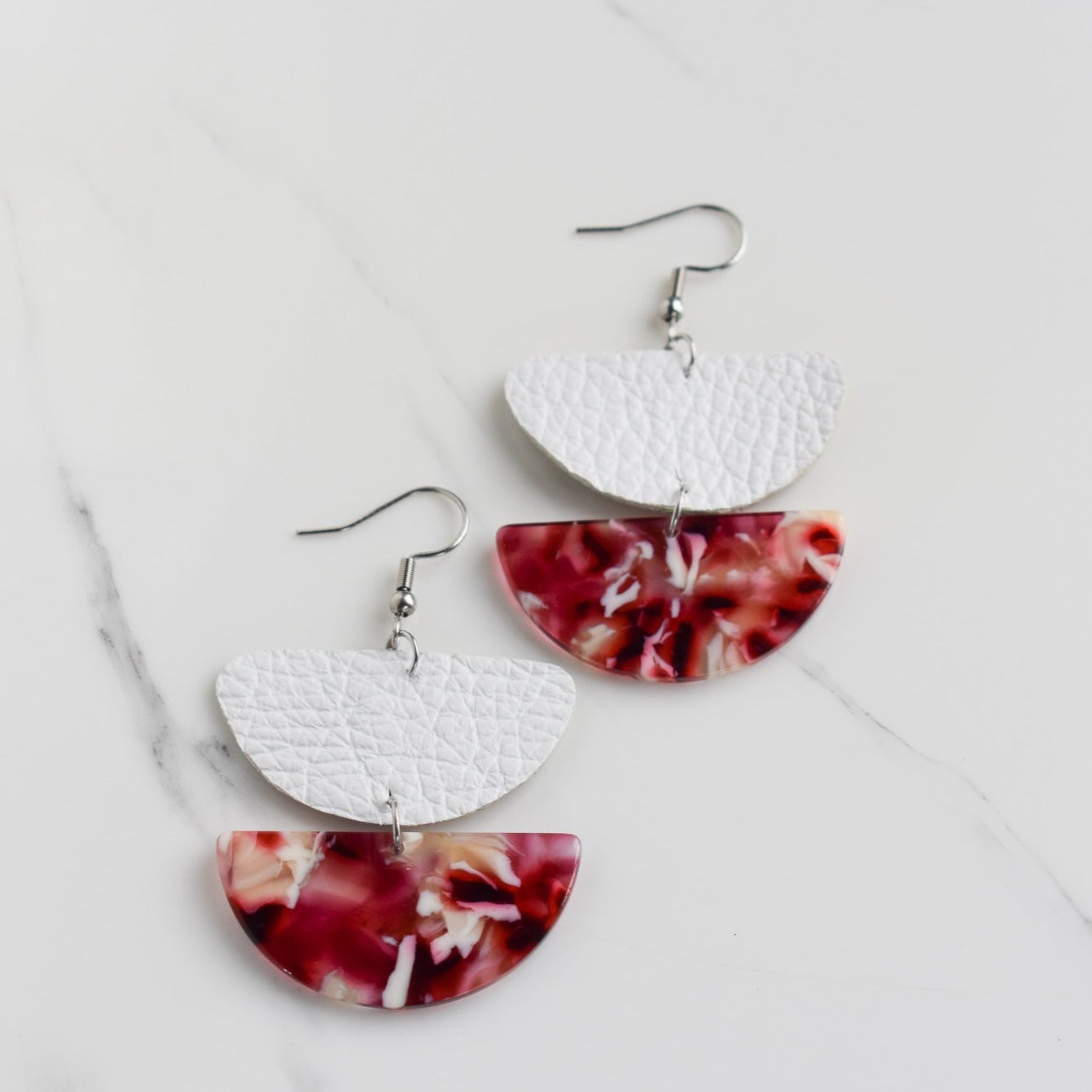 Handmade, light weight and comfortable to wear all day long leather earrings. All our earring hooks are made with a high quality stainless steel and they are hypo allergenic. They will not tarnish or irritate your sensitive skin.