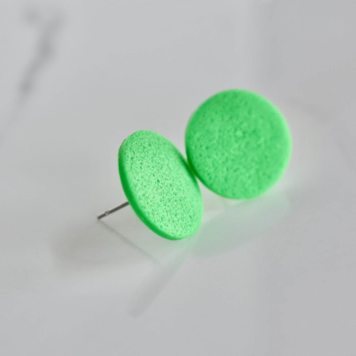 Handmade, light weight and comfortable to wear all day long clay studs earrings. Available in silver or gold. All our earring hooks are made with a high quality stainless steel and they are hypo allergenic. They will not tarnish or irritate your sensitive skin.