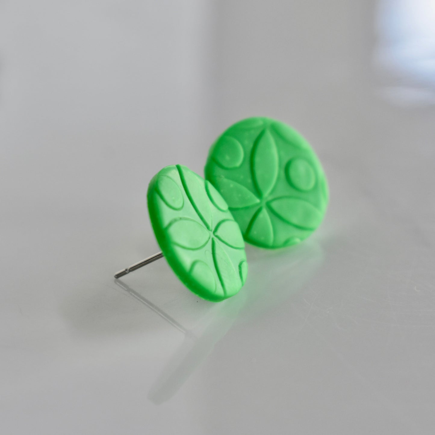 Handmade, light weight and comfortable to wear all day long clay studs earrings. Available in silver or gold. All our earring hooks are made with a high quality stainless steel and they are hypo allergenic. They will not tarnish or irritate your sensitive skin.