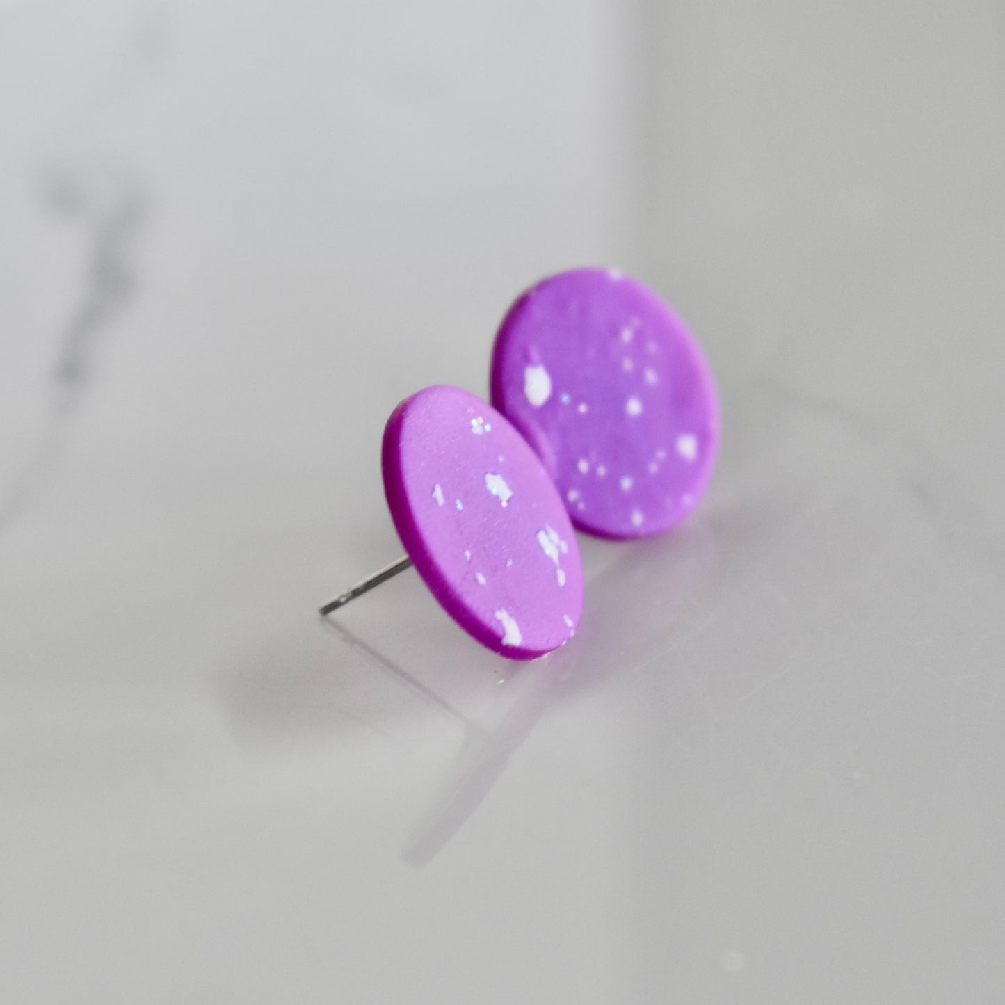 Handmade, light weight and comfortable to wear all day long clay studs earrings. Available in silver or gold. All our earring hooks are made with a high quality stainless steel and they are hypo allergenic. They will not tarnish or irritate your sensitive skin.