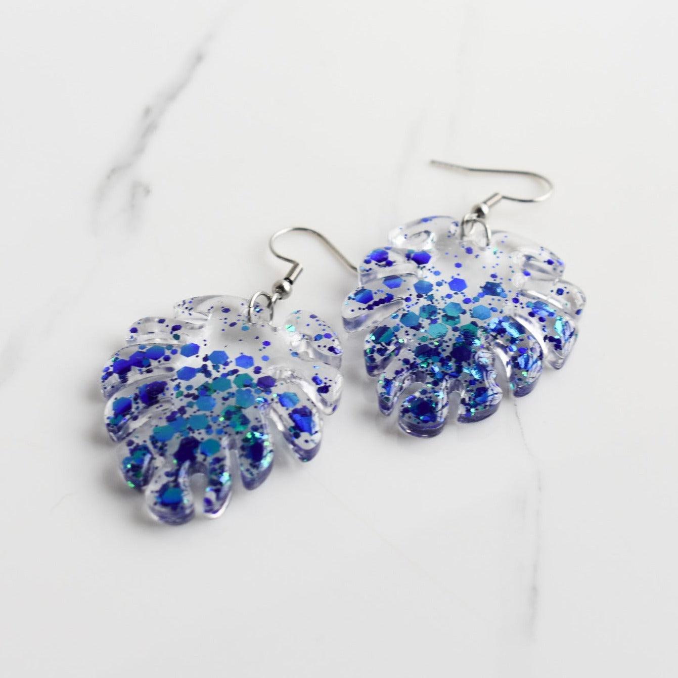 Handmade, light weight and comfortable to wear all day long leather earrings. All our earring hooks are made with a high quality stainless steel and they are hypo allergenic. They will not tarnish or irritate your sensitive skin.