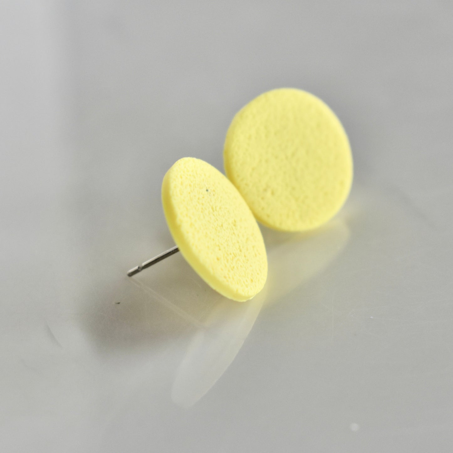 Handmade, light weight and comfortable to wear all day long clay studs earrings. Available in silver or gold. All our earring hooks are made with a high quality stainless steel and they are hypo allergenic. They will not tarnish or irritate your sensitive skin.