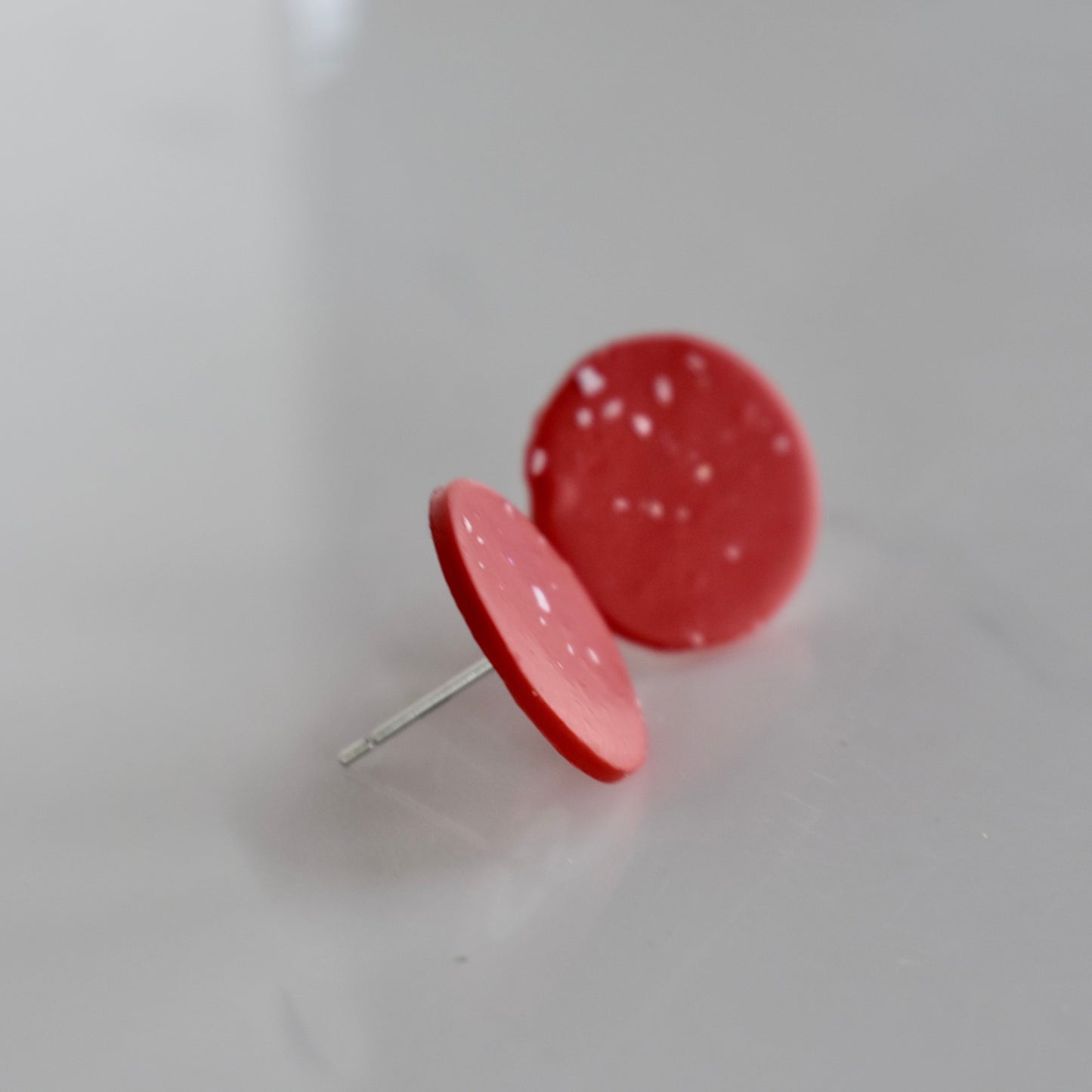 Handmade, light weight and comfortable to wear all day long clay studs earrings. Available in silver or gold. All our earring hooks are made with a high quality stainless steel and they are hypo allergenic. They will not tarnish or irritate your sensitive skin.