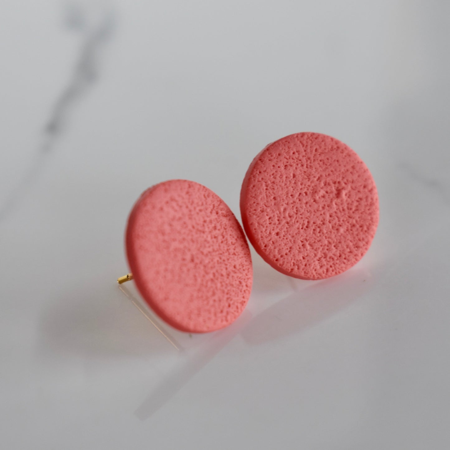 Handmade, light weight and comfortable to wear all day long clay studs earrings. Available in silver or gold. All our earring hooks are made with a high quality stainless steel and they are hypo allergenic. They will not tarnish or irritate your sensitive skin.