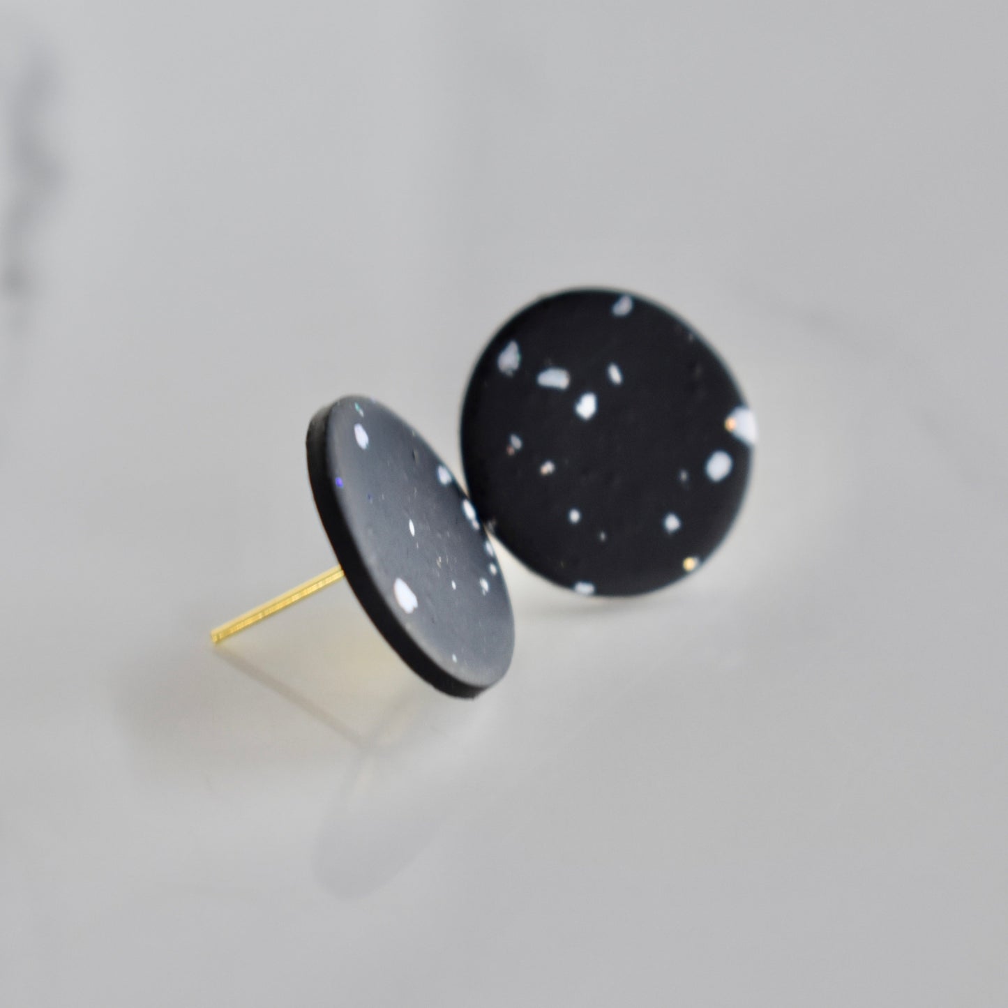 Handmade, light weight and comfortable to wear all day long clay studs earrings. Available in silver or gold. All our earring hooks are made with a high quality stainless steel and they are hypo allergenic. They will not tarnish or irritate your sensitive skin.