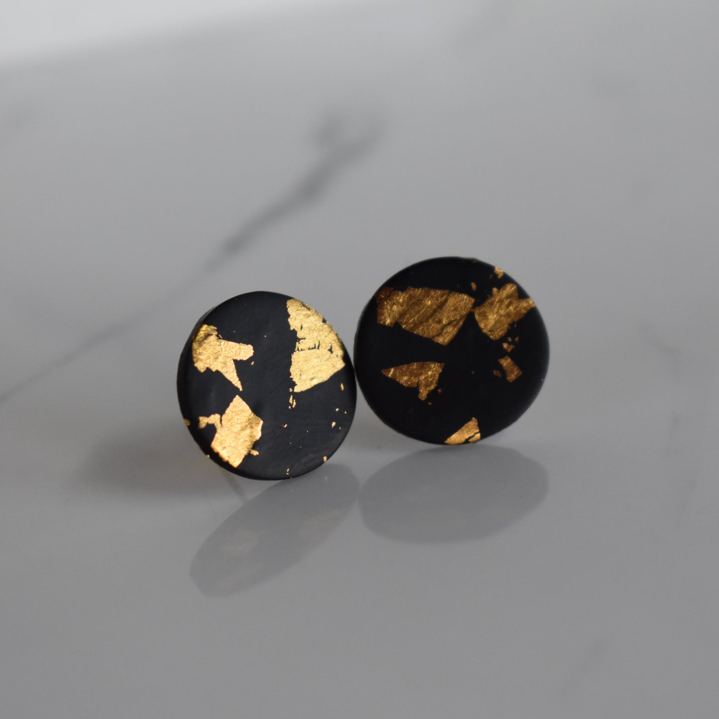 Handmade, light weight and comfortable to wear all day long clay studs earrings. Available in silver or gold. All our earring hooks are made with a high quality stainless steel and they are hypo allergenic. They will not tarnish or irritate your sensitive skin.
