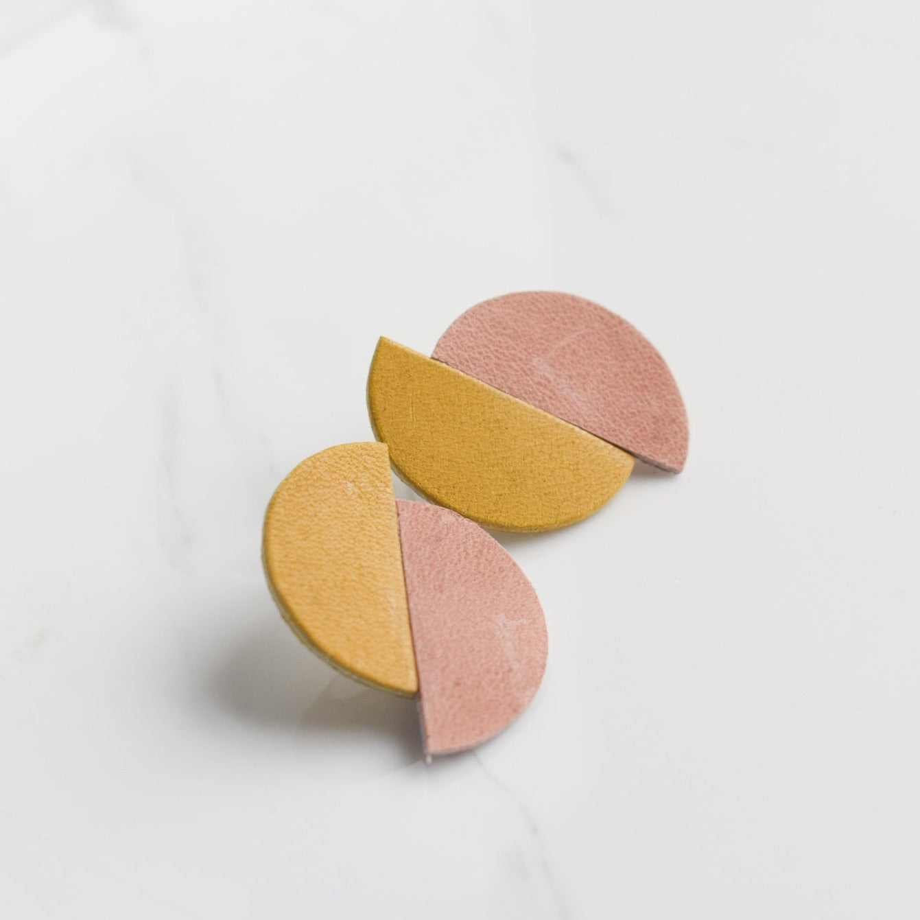Handmade, light weight and comfortable to wear all day long leather earrings. All our earring hooks are made with a high quality stainless steel and they are hypo allergenic. They will not tarnish or irritate your sensitive skin.