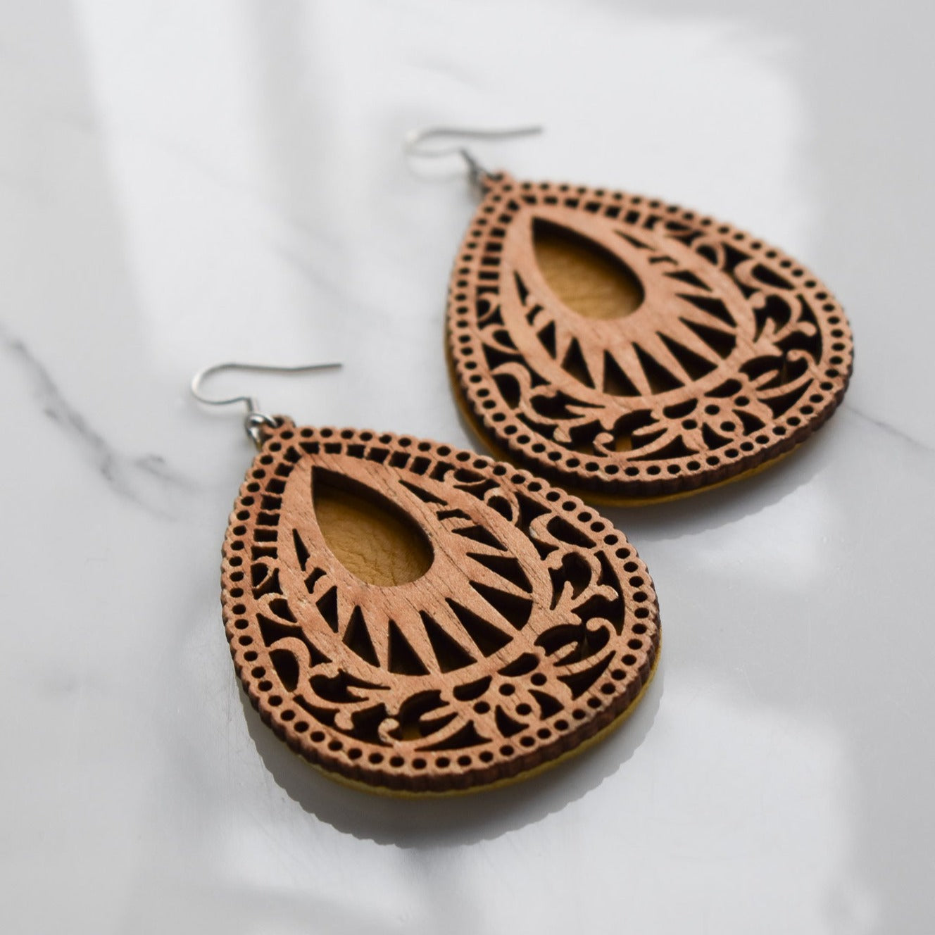 Handmade, light weight and comfortable to wear all day long leather earrings. All our earring hooks are made with a high quality stainless steel and they are hypo allergenic. They will not tarnish or irritate your sensitive skin.