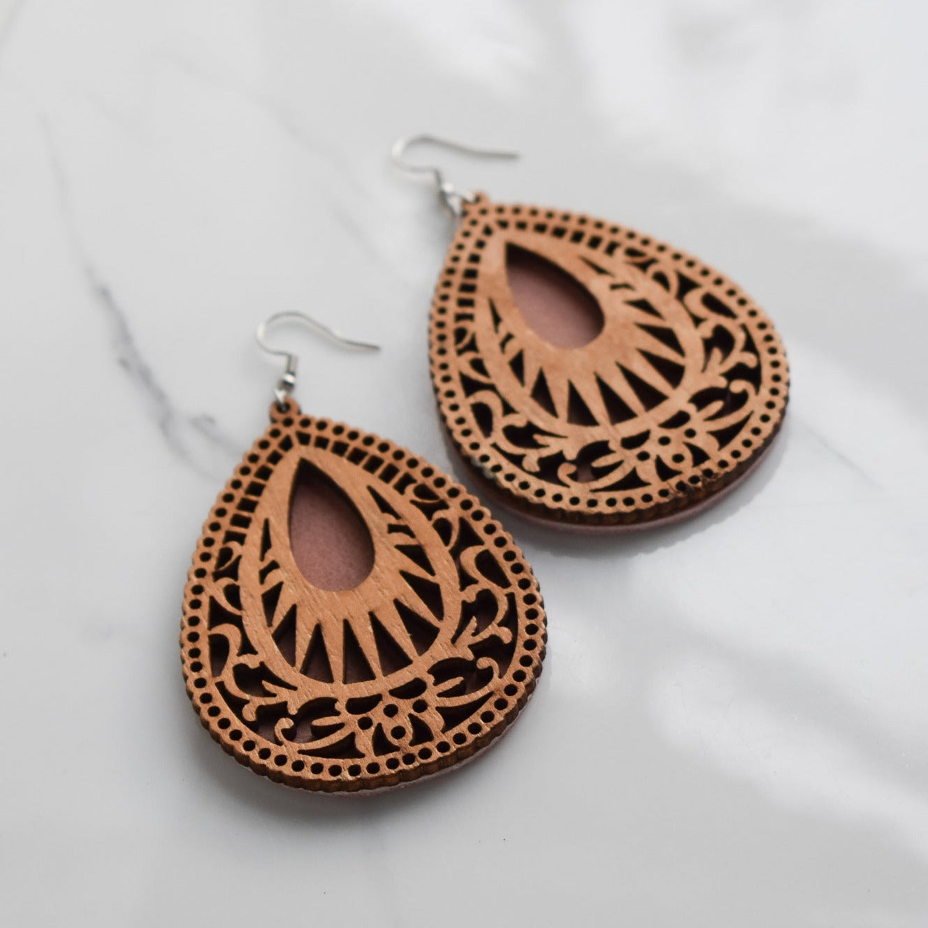 Handmade, light weight and comfortable to wear all day long leather earrings. All our earring hooks are made with a high quality stainless steel and they are hypo allergenic. They will not tarnish or irritate your sensitive skin.