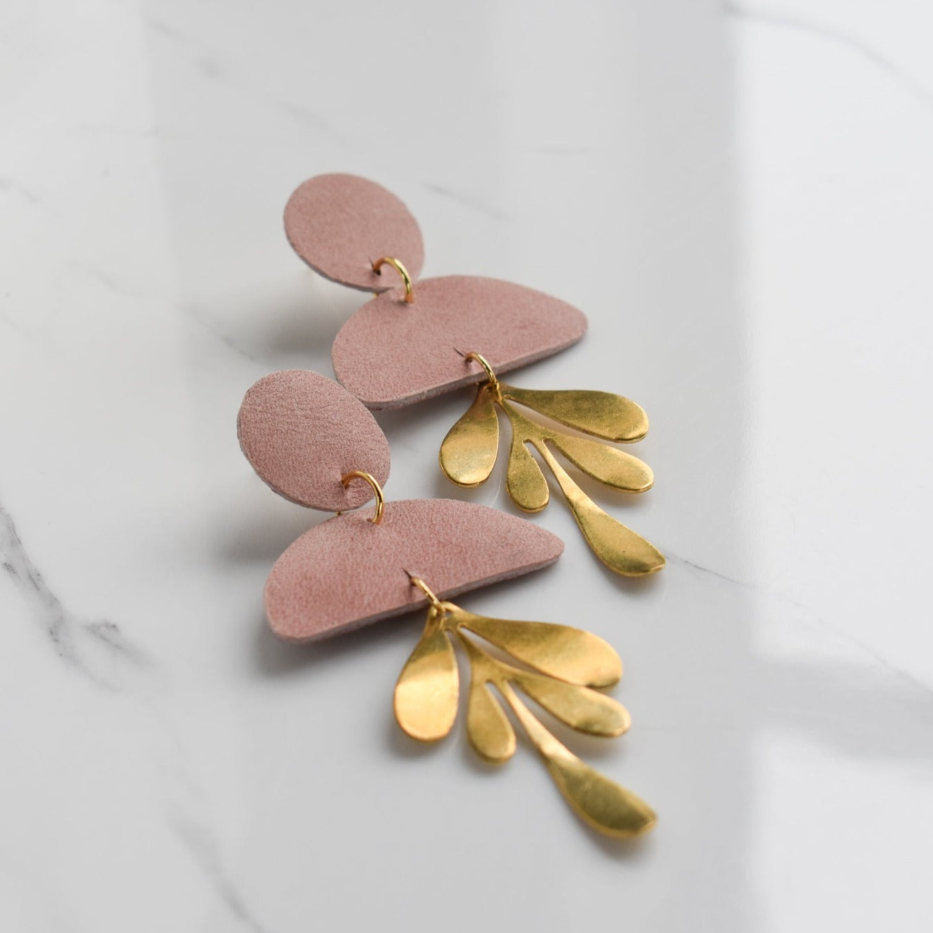 Handmade, light weight and comfortable to wear all day long leather earrings. All our earring hooks are made with a high quality stainless steel and they are hypo allergenic. They will not tarnish or irritate your sensitive skin.
