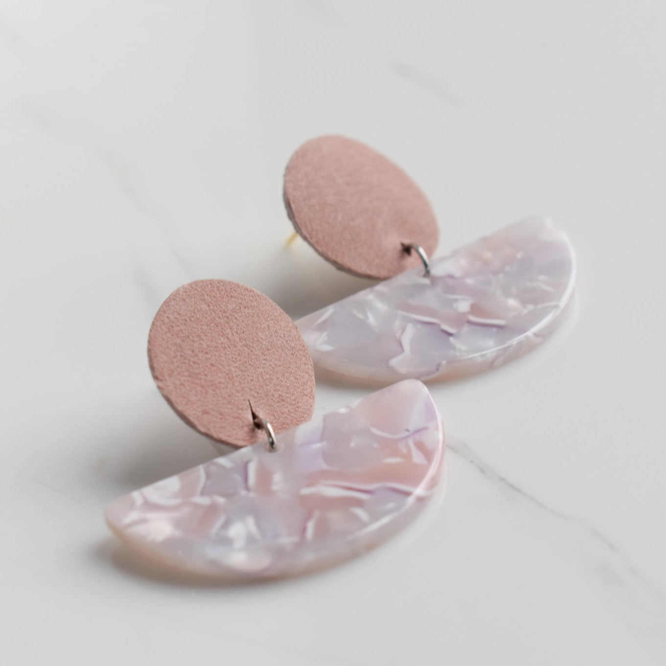 Handmade, light weight and comfortable to wear all day long leather earrings. All our earring hooks are made with a high quality stainless steel and they are hypo allergenic. They will not tarnish or irritate your sensitive skin.