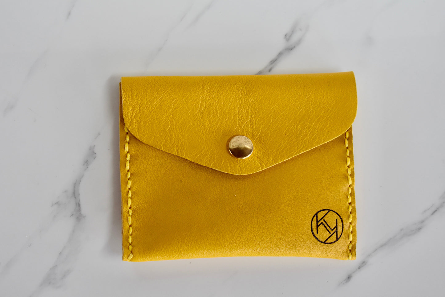 Beautifully handmade and hand stitched leather mini purse. Perfect for a quick trip to the shop. This also makes an amazing addition to a bridesmaids gift box.