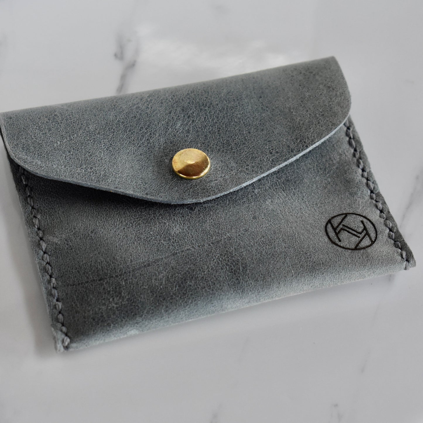 Beautifully handmade and hand stitched leather mini purse. Perfect for a quick trip to the shop. This also makes an amazing addition to a bridesmaids gift box.