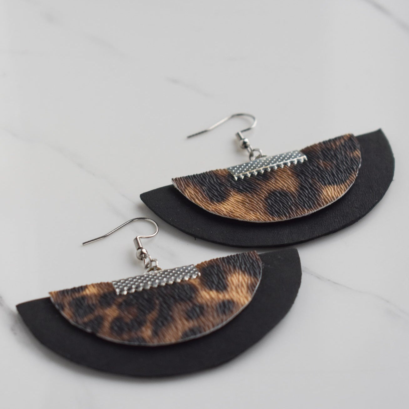 Handmade, light weight and comfortable to wear all day long leather earrings. All our earring hooks are made with a high quality stainless steel and they are hypo allergenic. They will not tarnish or irritate your sensitive skin.