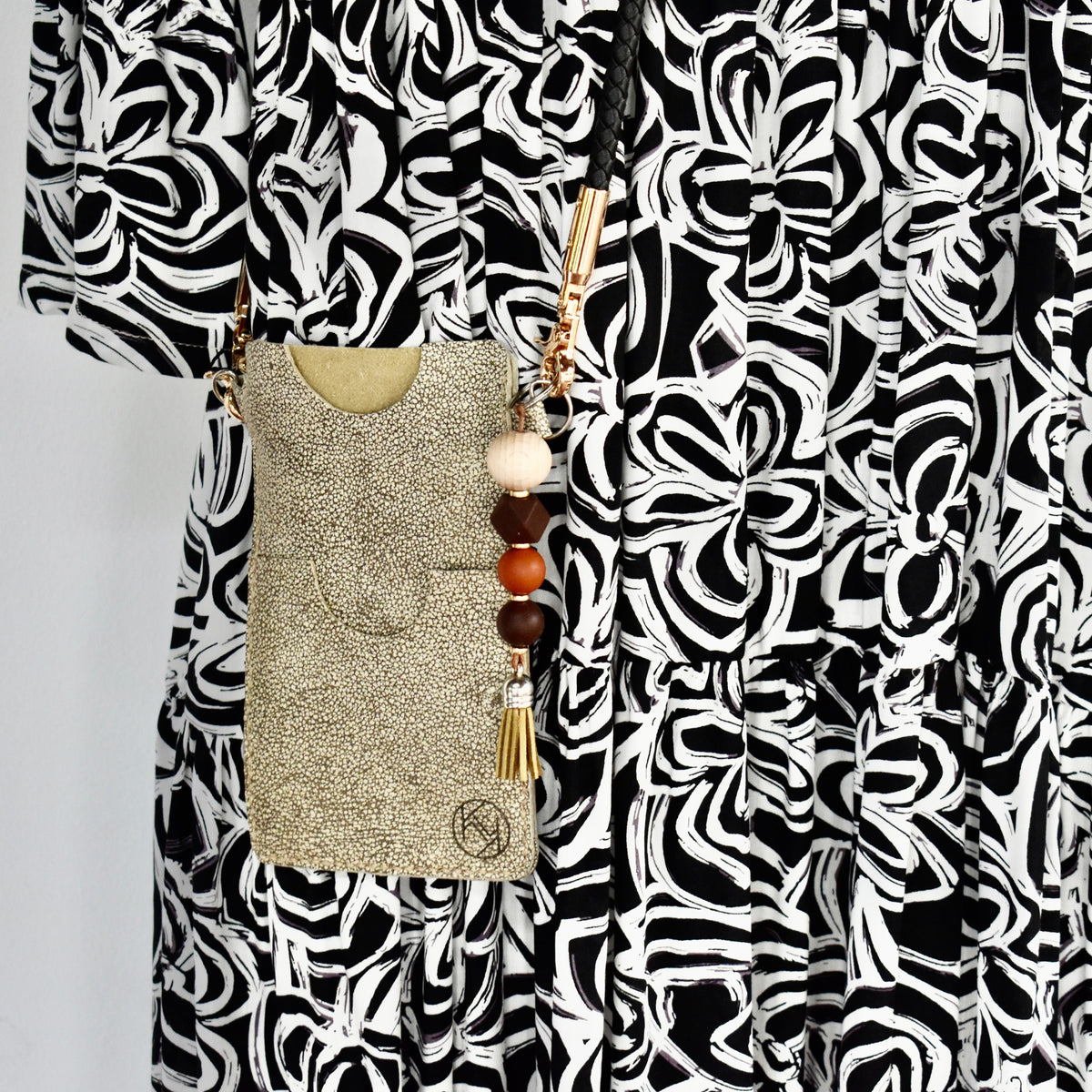 Beautifully handmade and hand stitched leather cellphone sling. Perfect for everyday use. It has a slot for cards and cash. Turn your sling towards your body for extra safety. This also makes an amazing gift and addition to a bridesmaids gift box. YOUR NEW BEST FRIEND - keep your belongings HANDS ON!