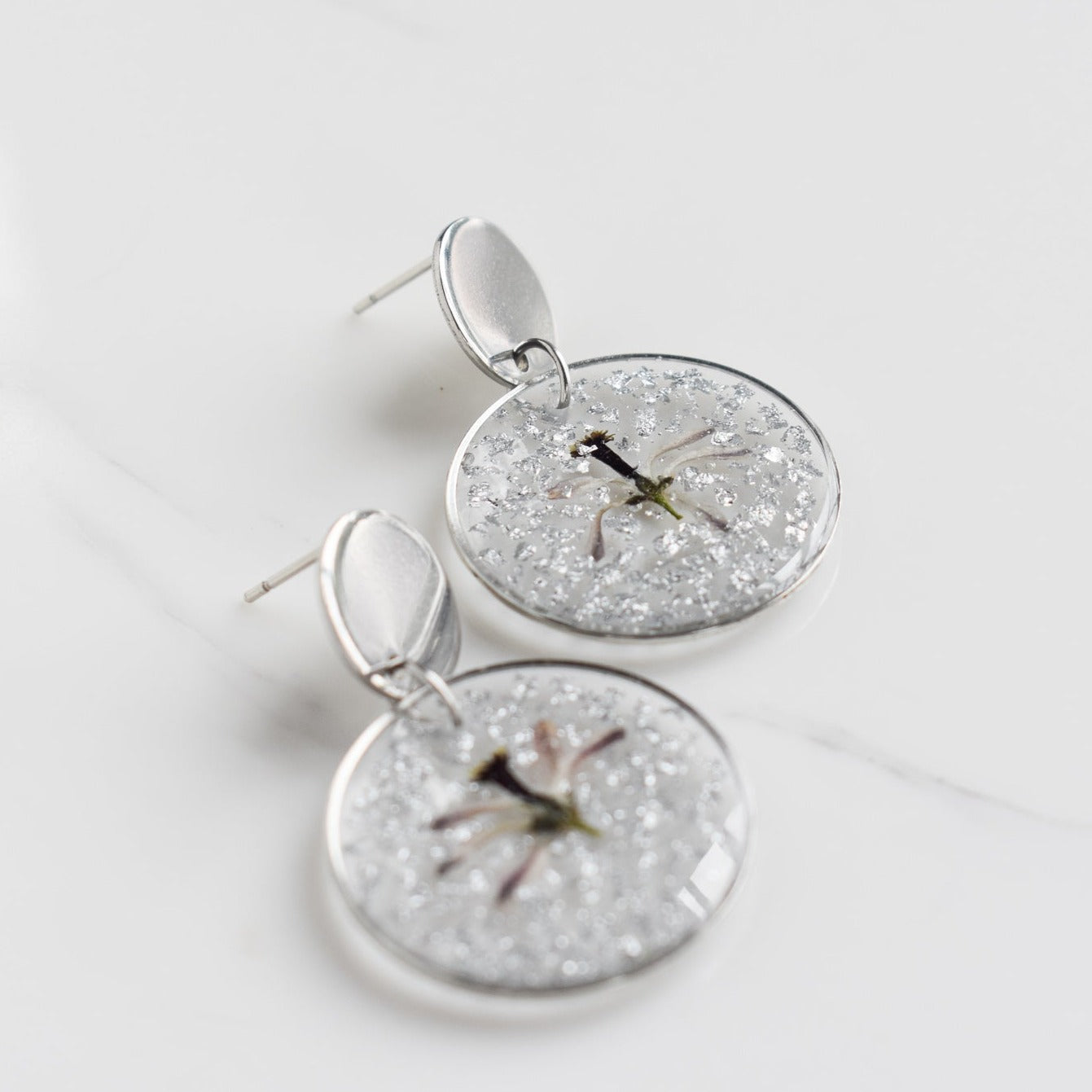 Handmade, light weight and comfortable to wear all day long leather earrings. All our earring hooks are made with a high quality stainless steel and they are hypo allergenic. They will not tarnish or irritate your sensitive skin.