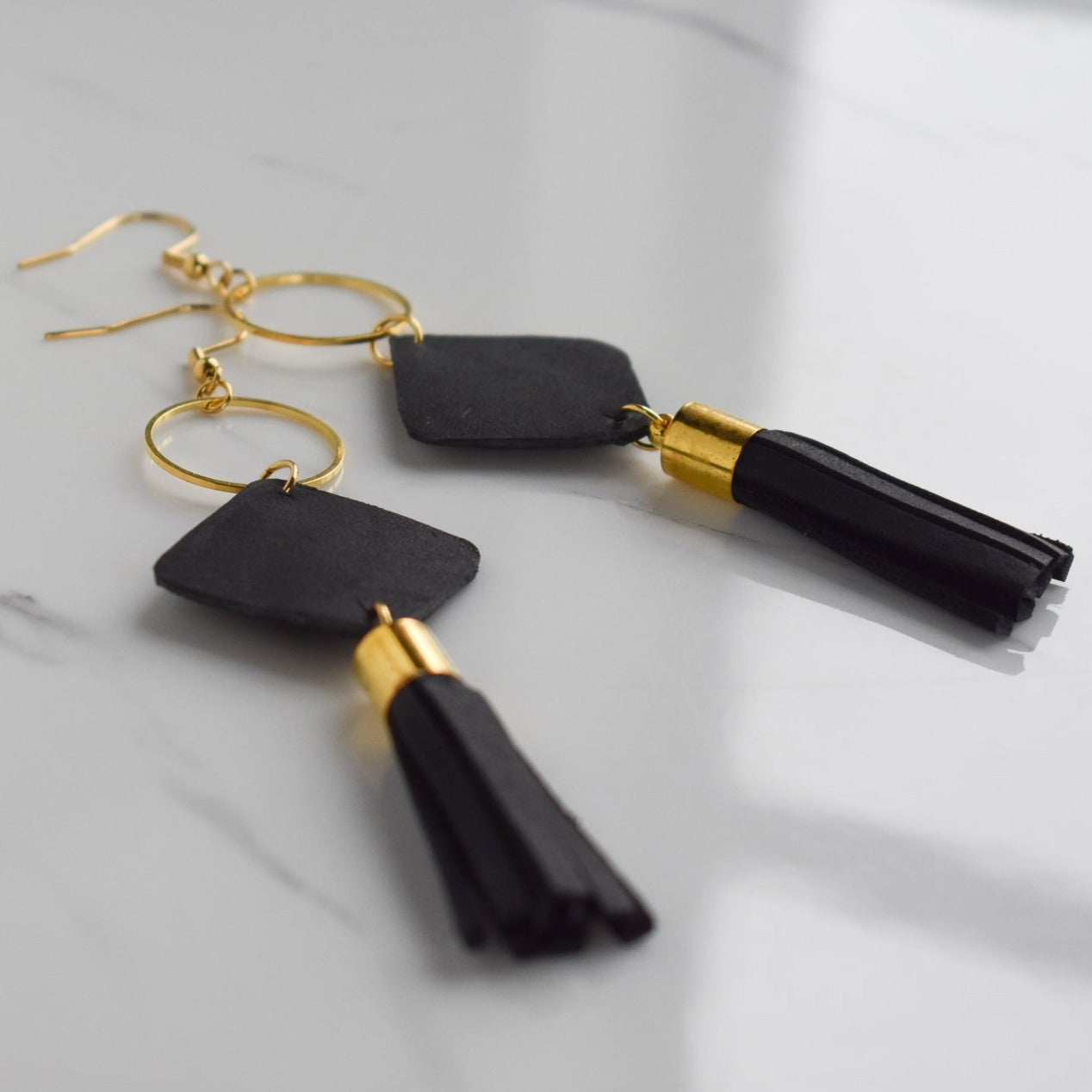 Handmade, light weight and comfortable to wear all day long leather earrings. All our earring hooks are made with a high quality stainless steel and they are hypo allergenic. They will not tarnish or irritate your sensitive skin.