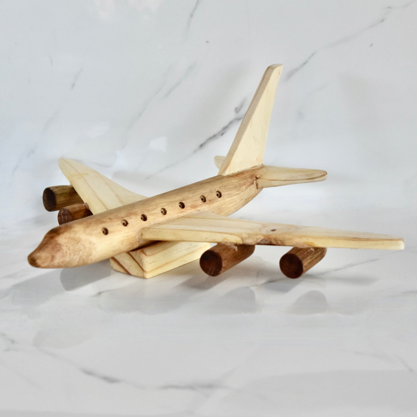 This small handmade wooden plane is the perfect present for any kid (or kid at heart)! It can be left as is or painted for an extra touch of fun. Makes for an amazing baby shower gift.