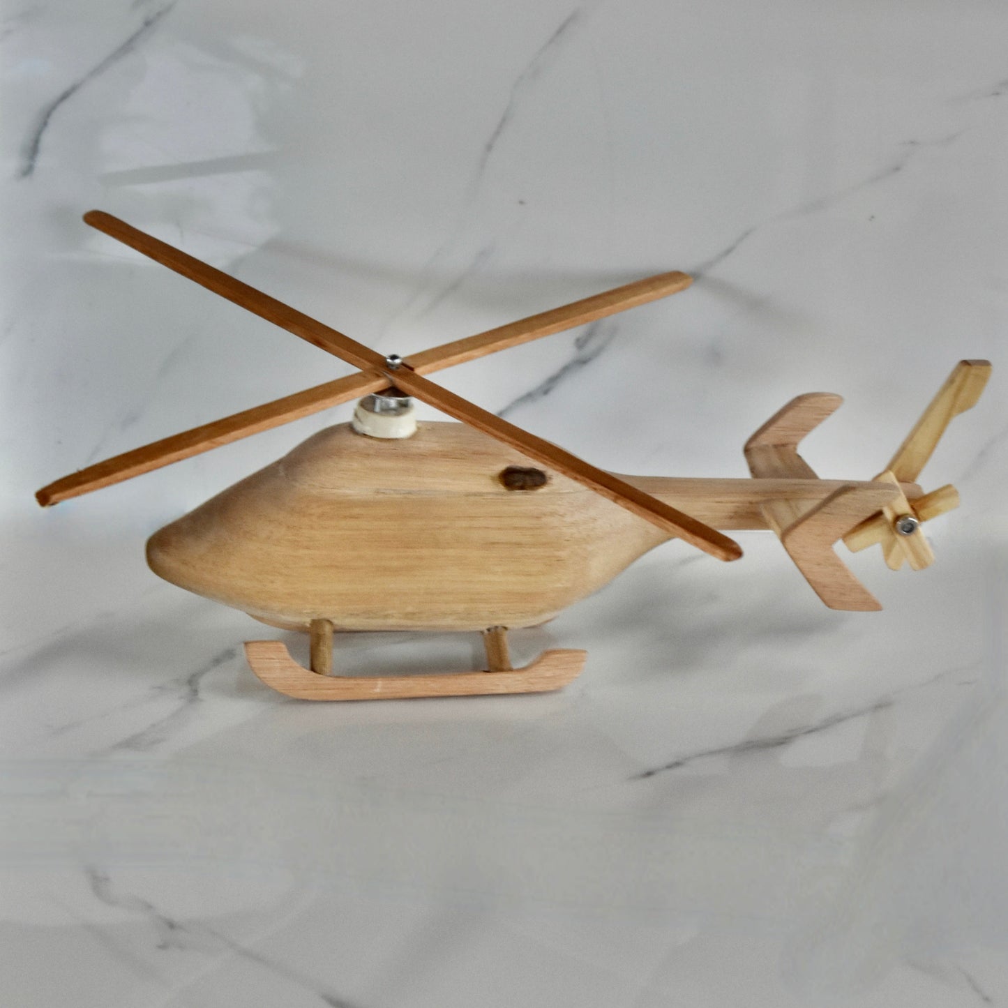 This small handmade wooden helicopter is the perfect present for any kid (or kid at heart)! It can be left as is or painted for an extra touch of fun. Makes for an amazing baby shower gift.