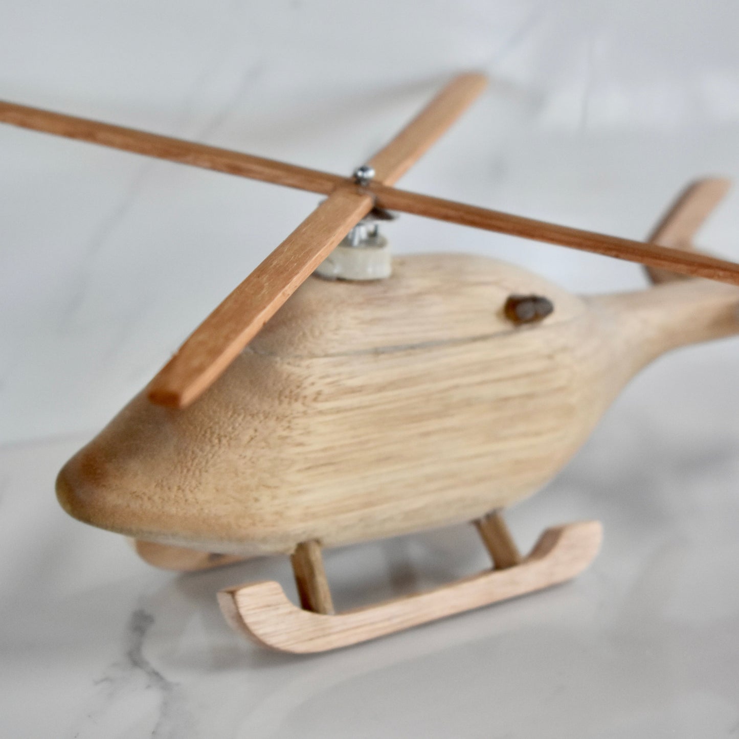This small handmade wooden helicopter is the perfect present for any kid (or kid at heart)! It can be left as is or painted for an extra touch of fun. Makes for an amazing baby shower gift.