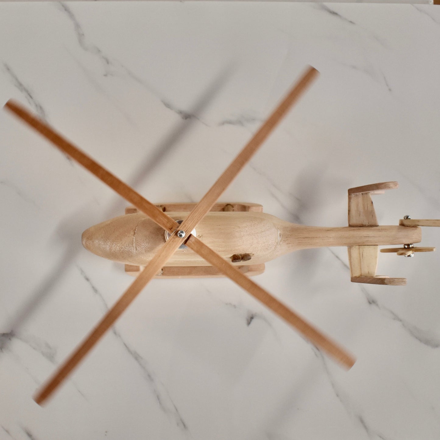 This small handmade wooden helicopter is the perfect present for any kid (or kid at heart)! It can be left as is or painted for an extra touch of fun. Makes for an amazing baby shower gift.